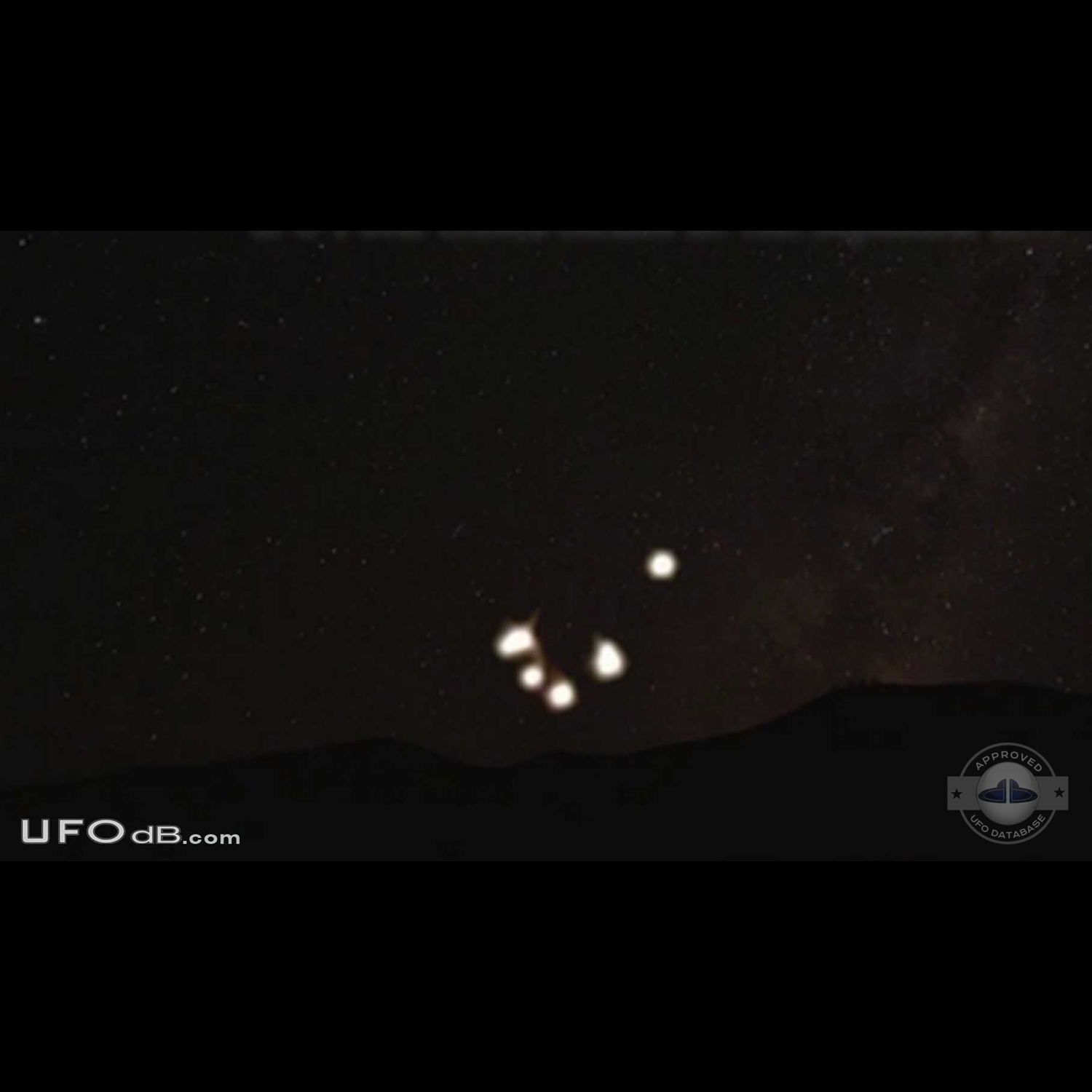 Formation of UFOs of different sizes in the night over Crimea, Ukraine UFO Picture #385-1