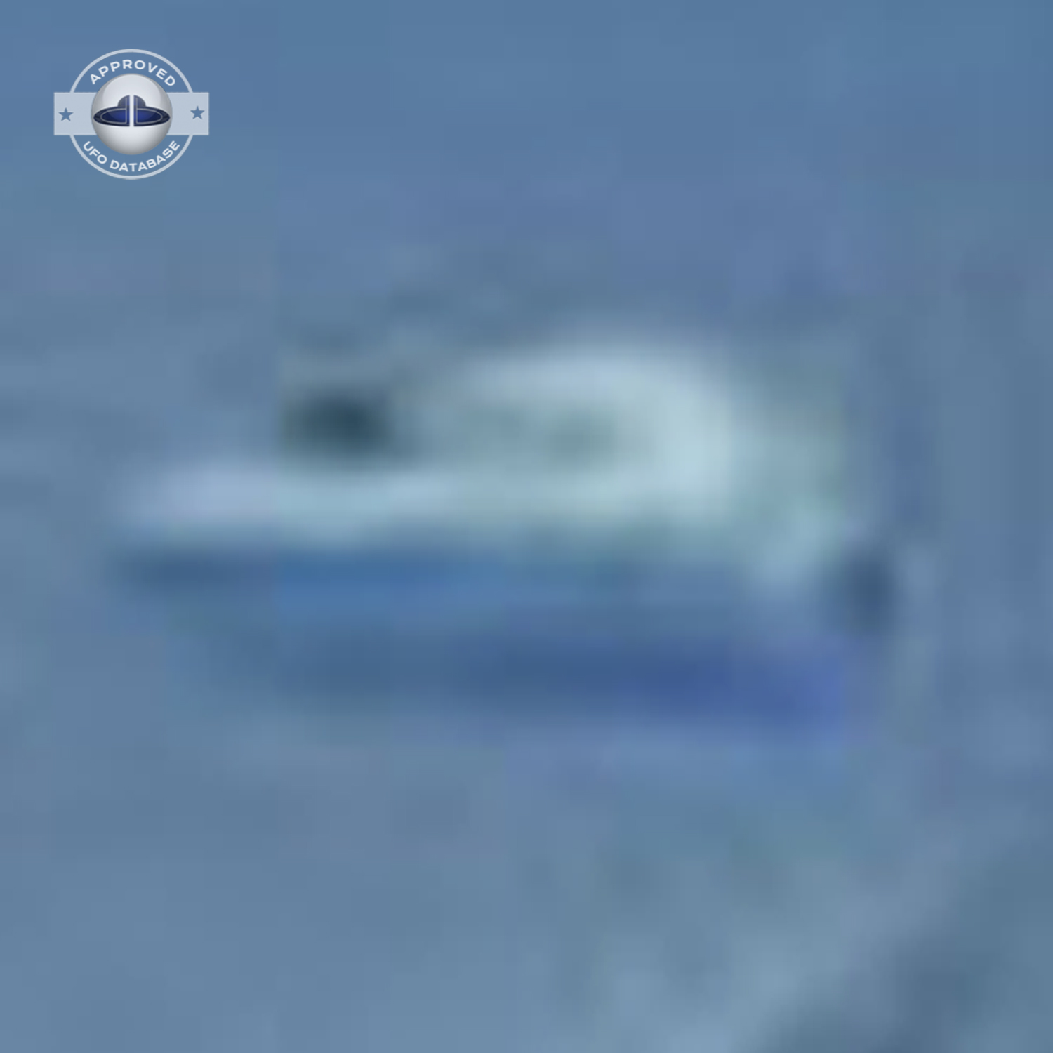 UFO picture taken inside a car showing a UFO with a pod spaceship look UFO Picture #39-6