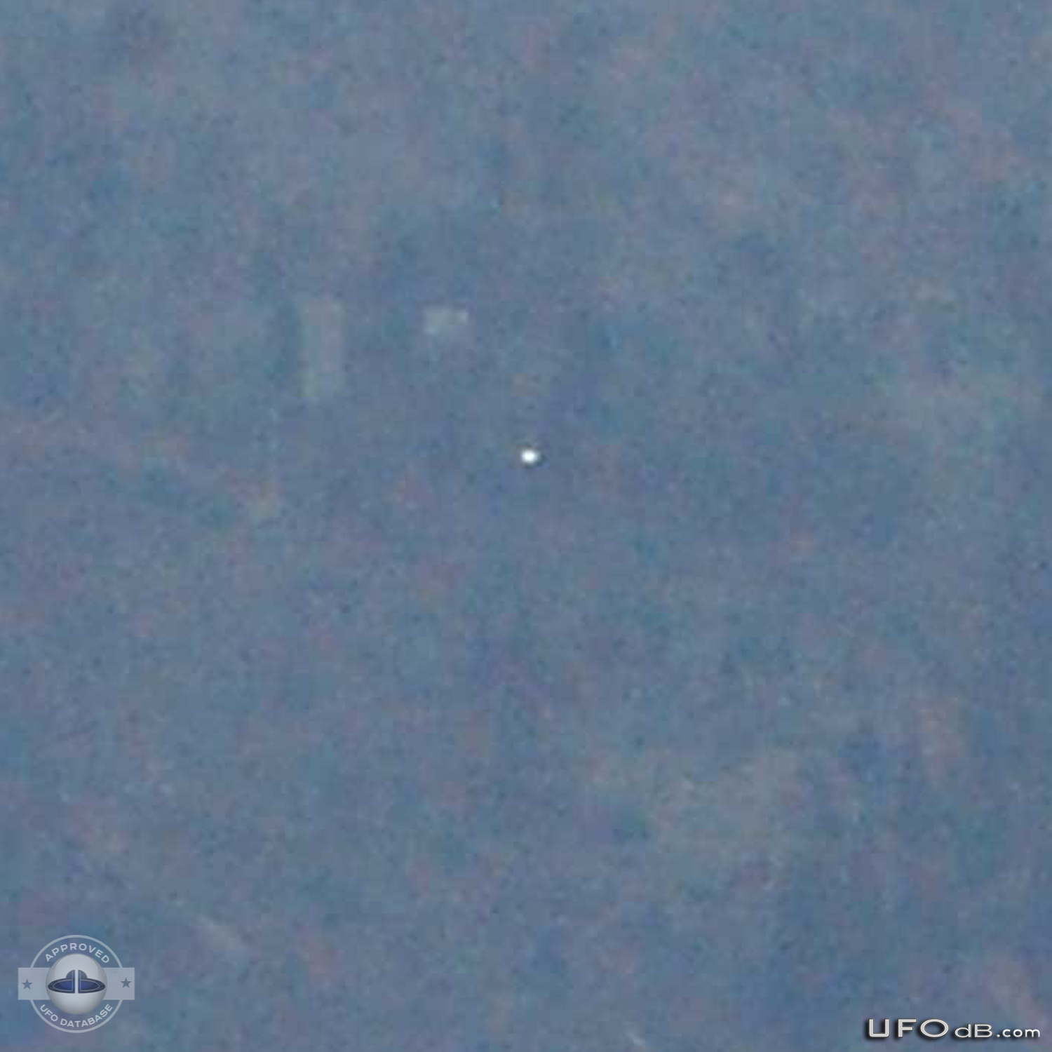 White saucer ufo over the city of Mostar in Bosnia caught on picture UFO Picture #396-2