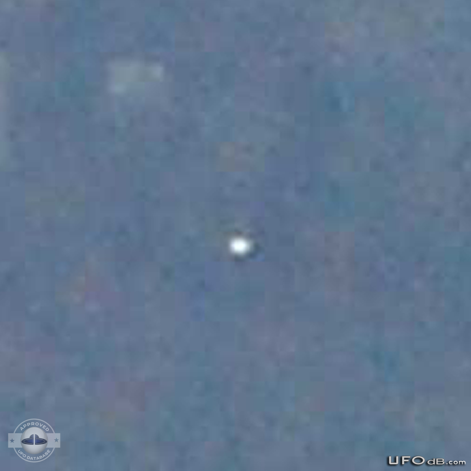 White saucer ufo over the city of Mostar in Bosnia caught on picture UFO Picture #396-3