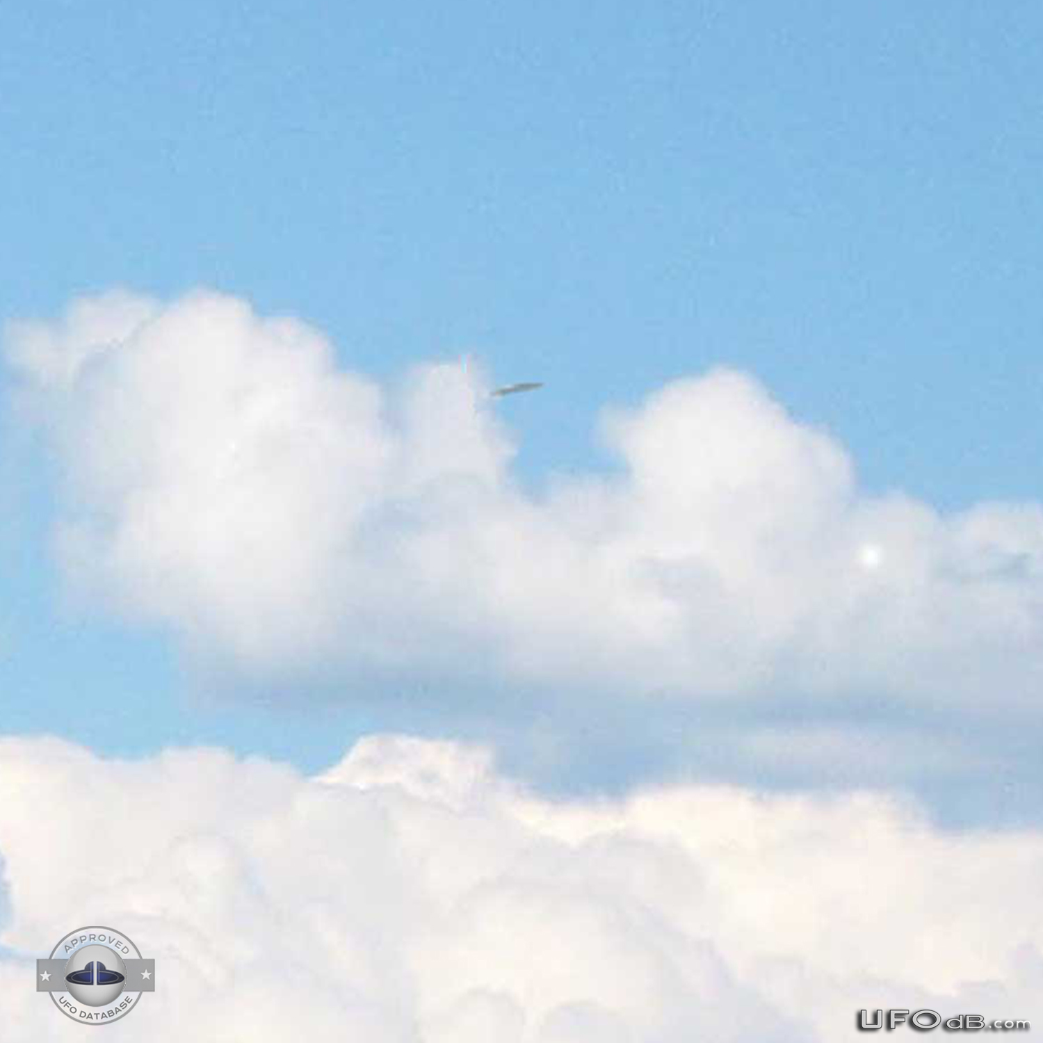 UFO in the distance over Dunoon, Scotland caught on picture in 2010 UFO Picture #398-2