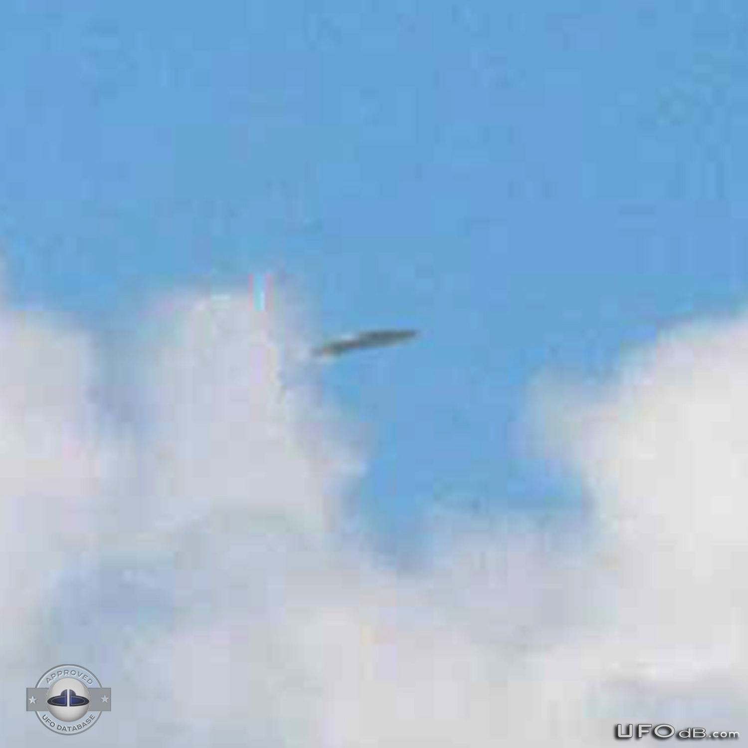 UFO in the distance over Dunoon, Scotland caught on picture in 2010 UFO Picture #398-3