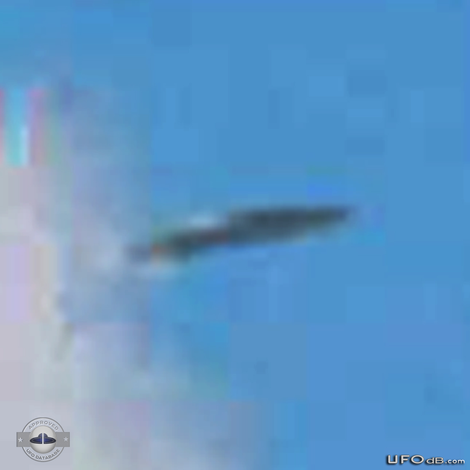 UFO in the distance over Dunoon, Scotland caught on picture in 2010 UFO Picture #398-4