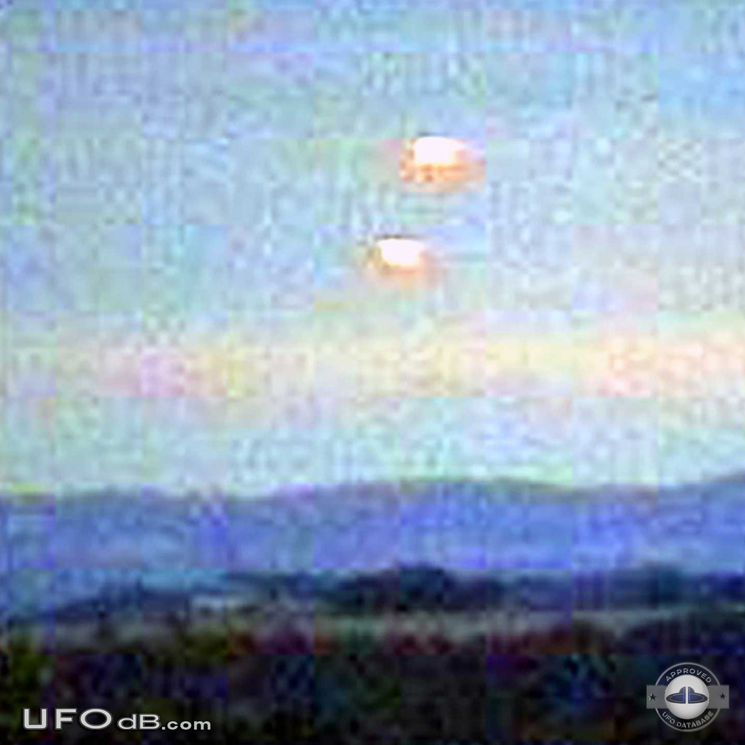 Rare picture of twin UFO saucers over Cyprus taken in 2007 UFO Picture #399-1