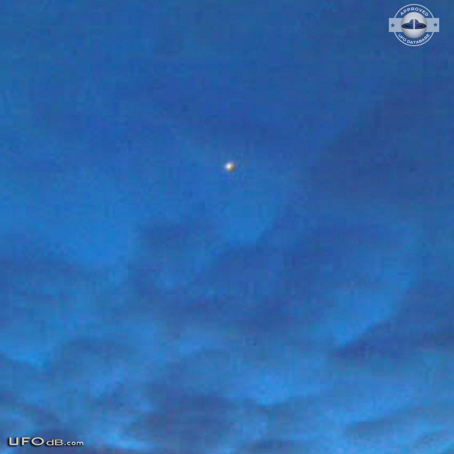 Fleet of 7 ufos changing color caught on photo over Riga, Latvia 2010 UFO Picture #405-3
