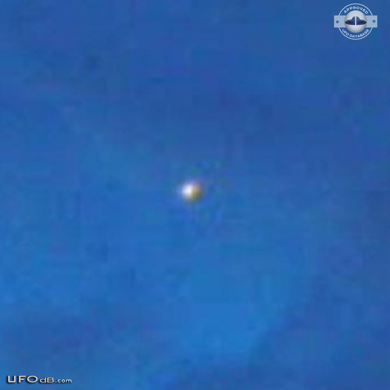 Fleet of 7 ufos changing color caught on photo over Riga, Latvia 2010 UFO Picture #405-4
