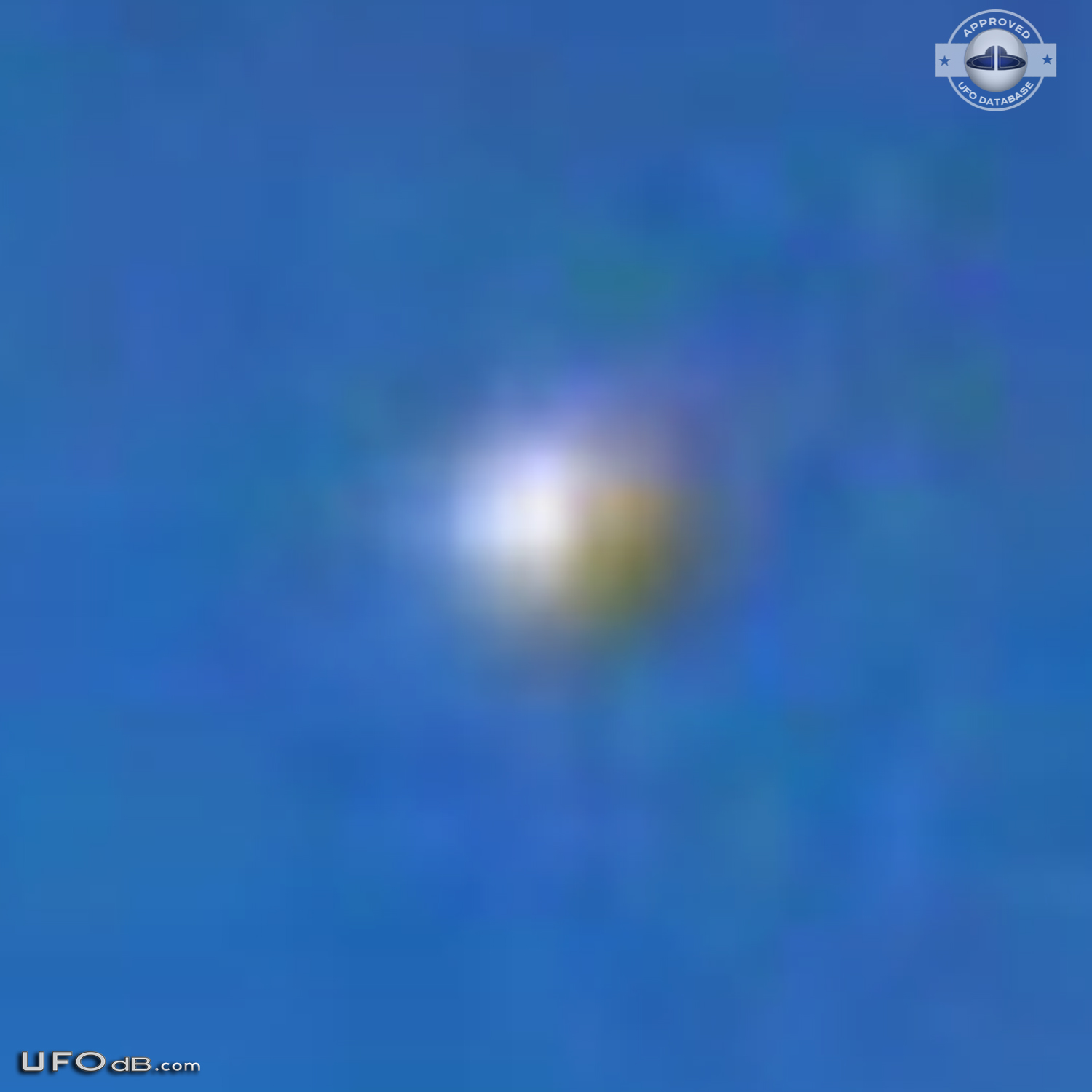 Fleet of 7 ufos changing color caught on photo over Riga, Latvia 2010 UFO Picture #405-5