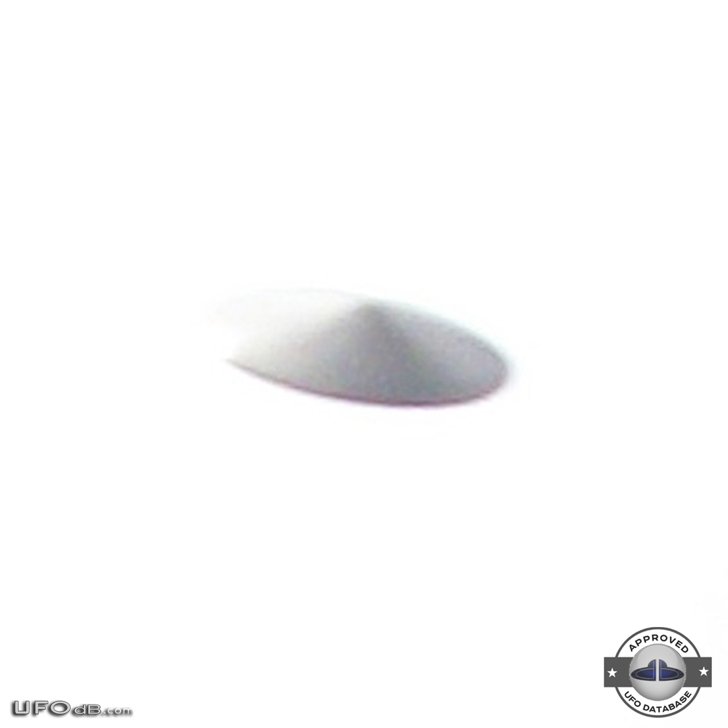 Silver saucer UFO caught on picture in Bristol, England UK - 2010 UFO Picture #412-3