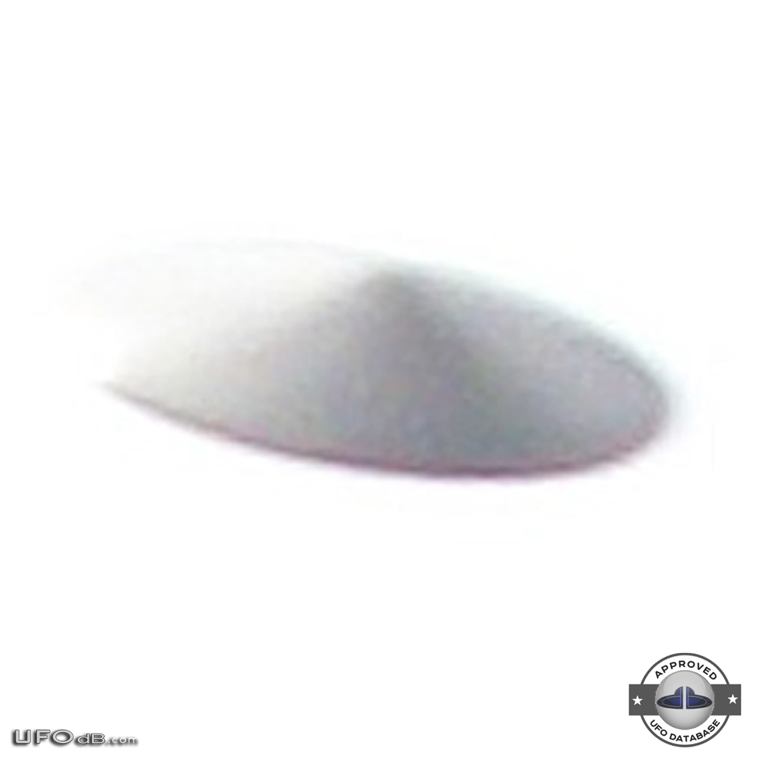 Silver saucer UFO caught on picture in Bristol, England UK - 2010 UFO Picture #412-4