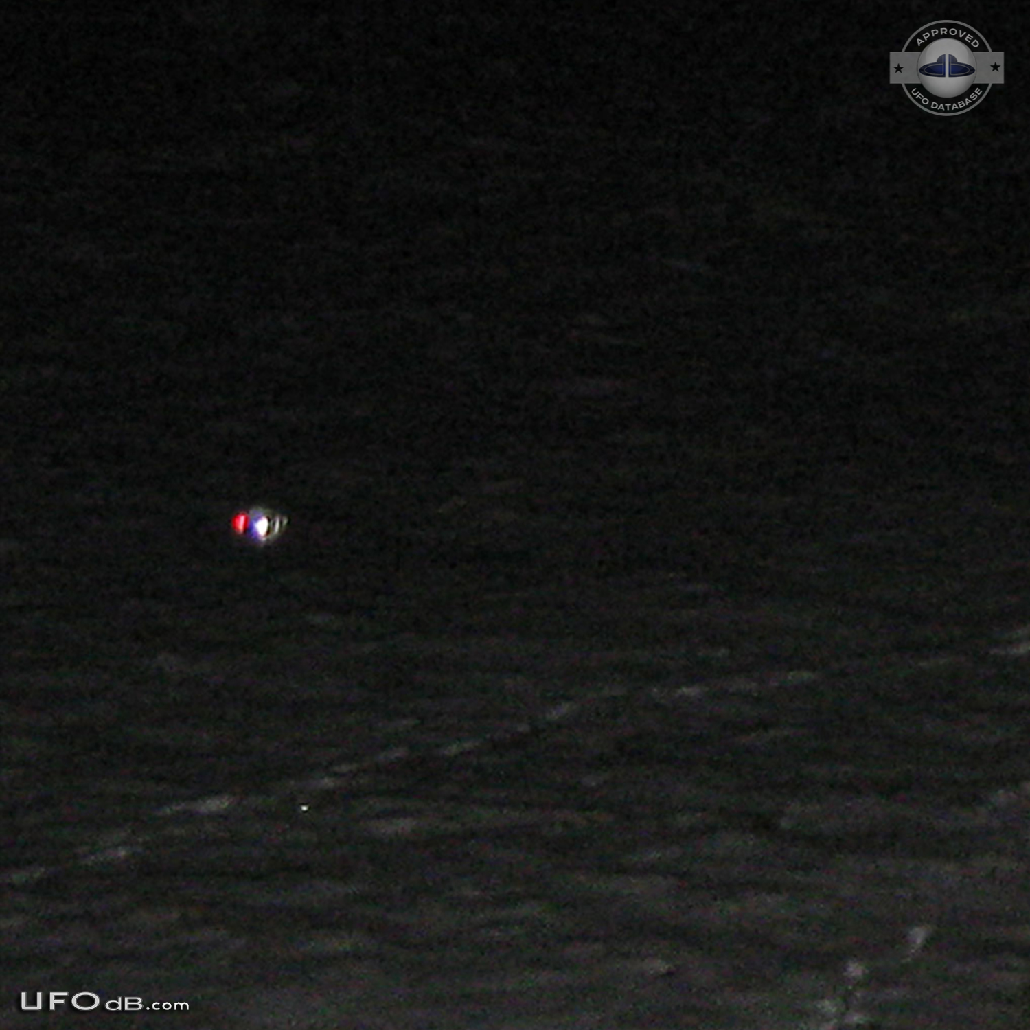 Probe UFO near the snow touching it - Kansas City, Missouri - 2012 UFO Picture #415-2