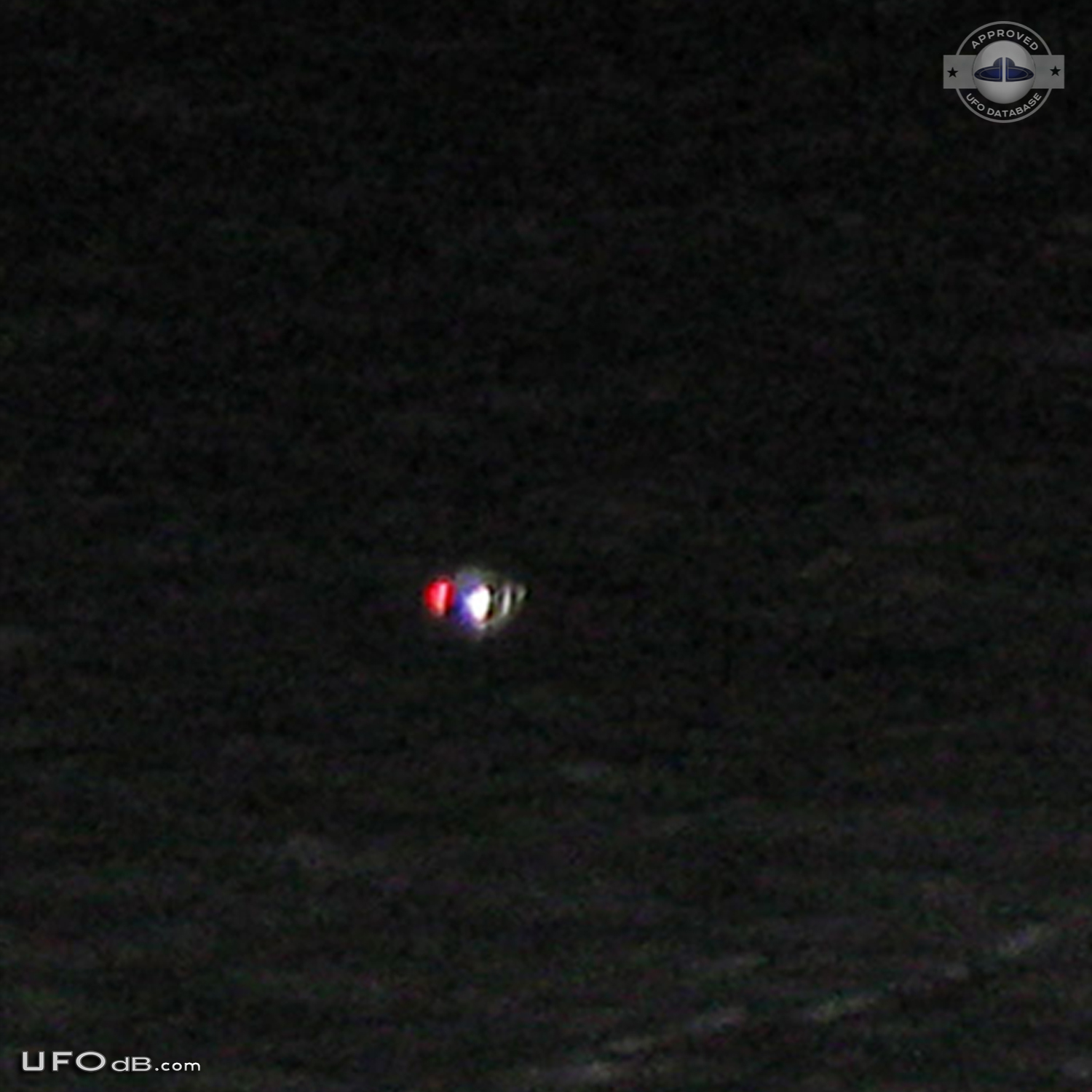 Probe UFO near the snow touching it - Kansas City, Missouri - 2012 UFO Picture #415-3