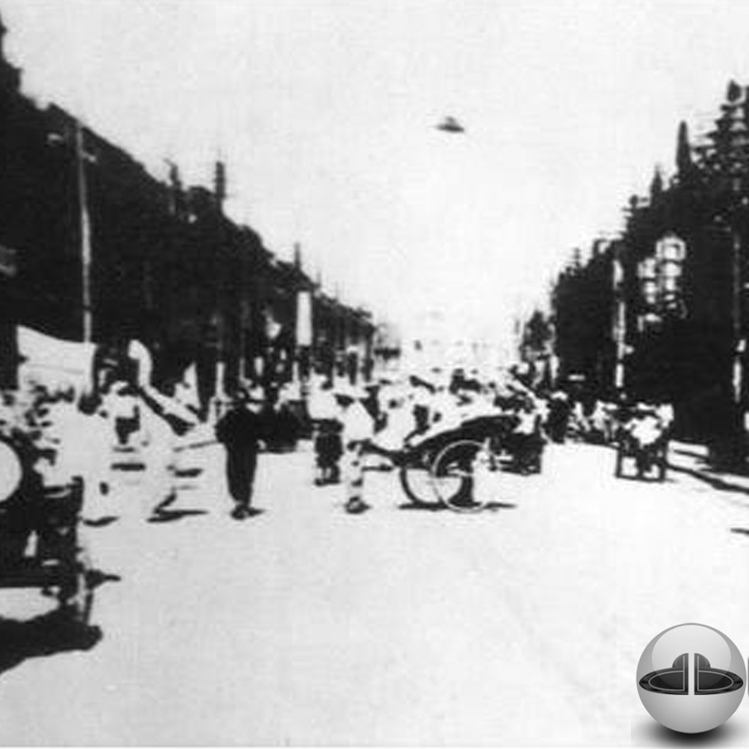 Black and white UFO picture showing UFO flying over busy street UFO Picture #43-2