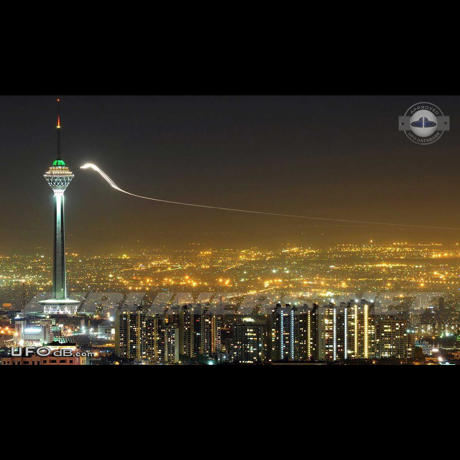 Glowing UFO with long trail near Milad Tower, Tehran, Iran 2012 UFO Picture #437-1