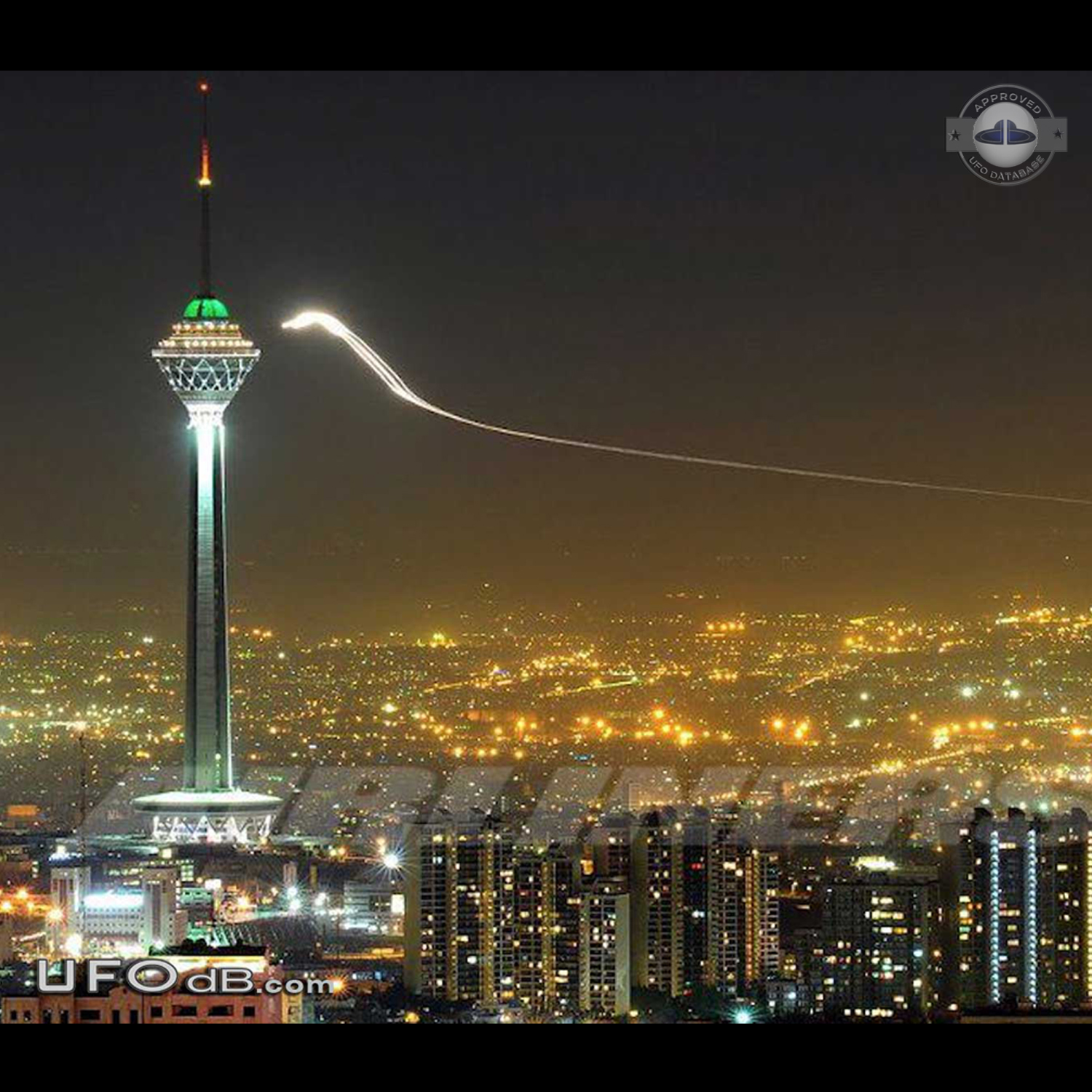Glowing UFO with long trail near Milad Tower, Tehran, Iran 2012 UFO Picture #437-2
