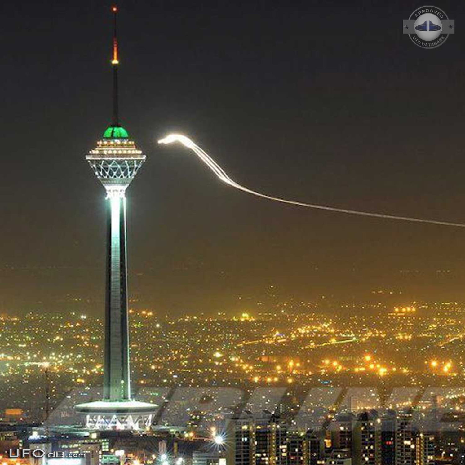 Glowing UFO with long trail near Milad Tower, Tehran, Iran 2012 UFO Picture #437-3