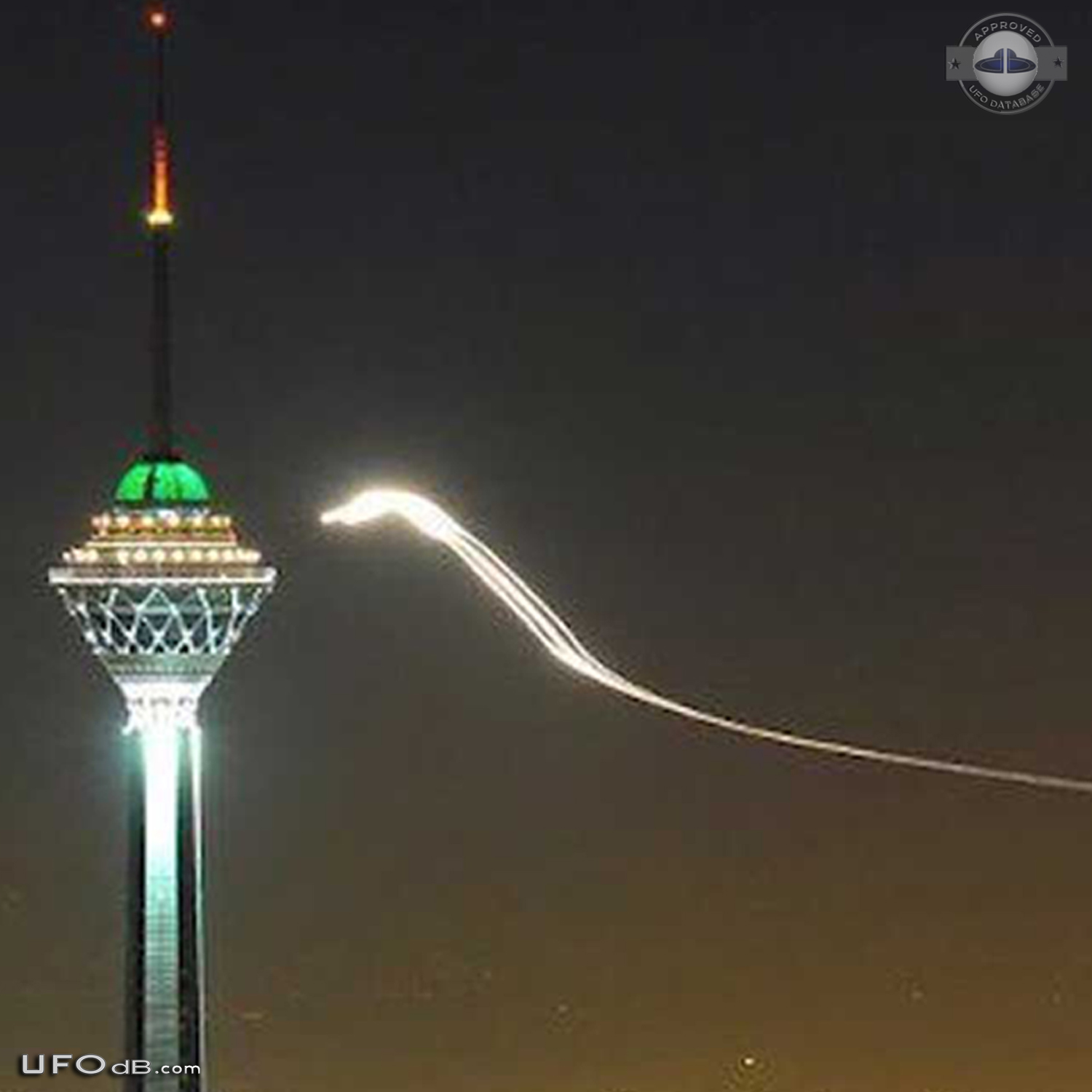 Glowing UFO with long trail near Milad Tower, Tehran, Iran 2012 UFO Picture #437-4
