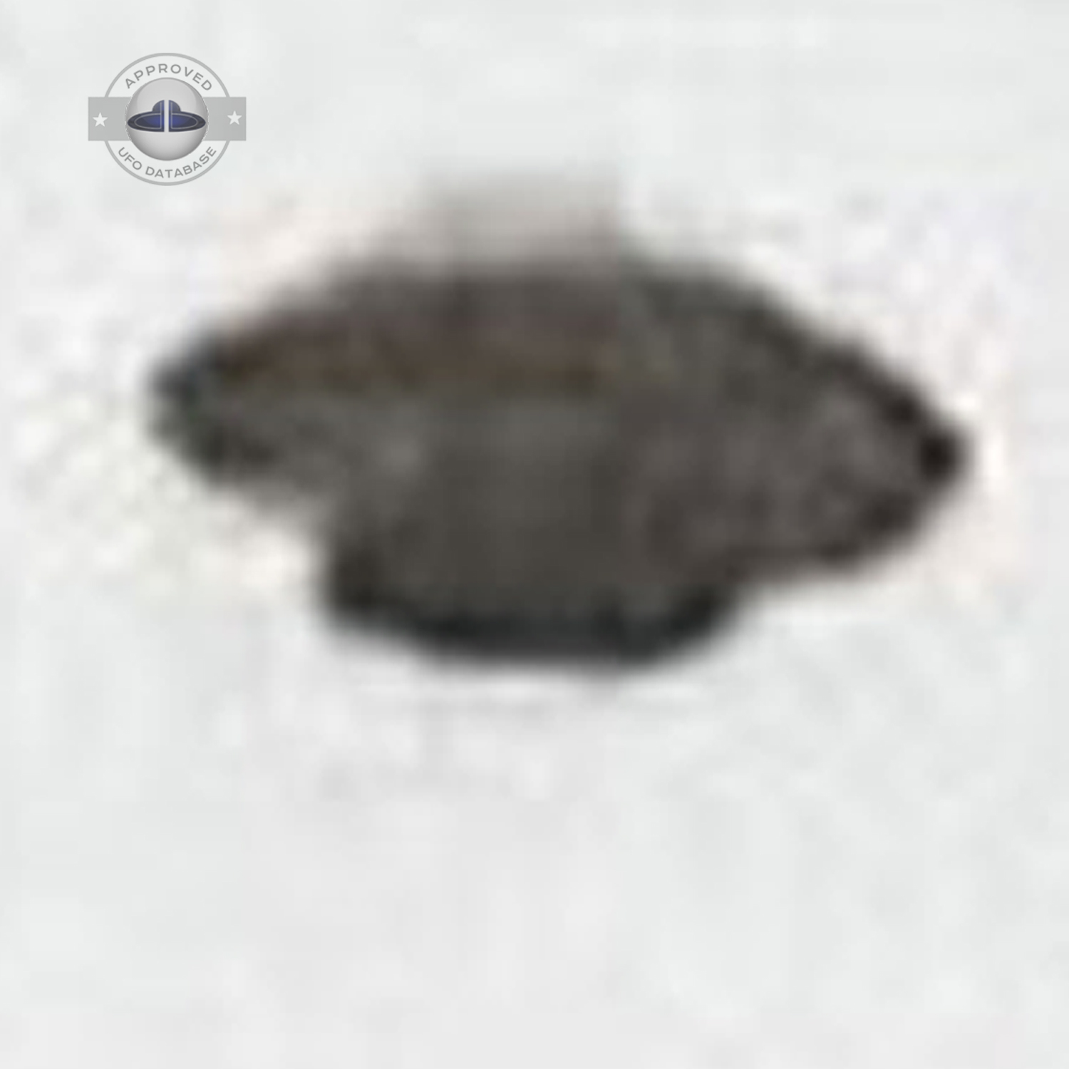 UFO muffin shape flying saucer standing over electrical stucture UFO Picture #46-6