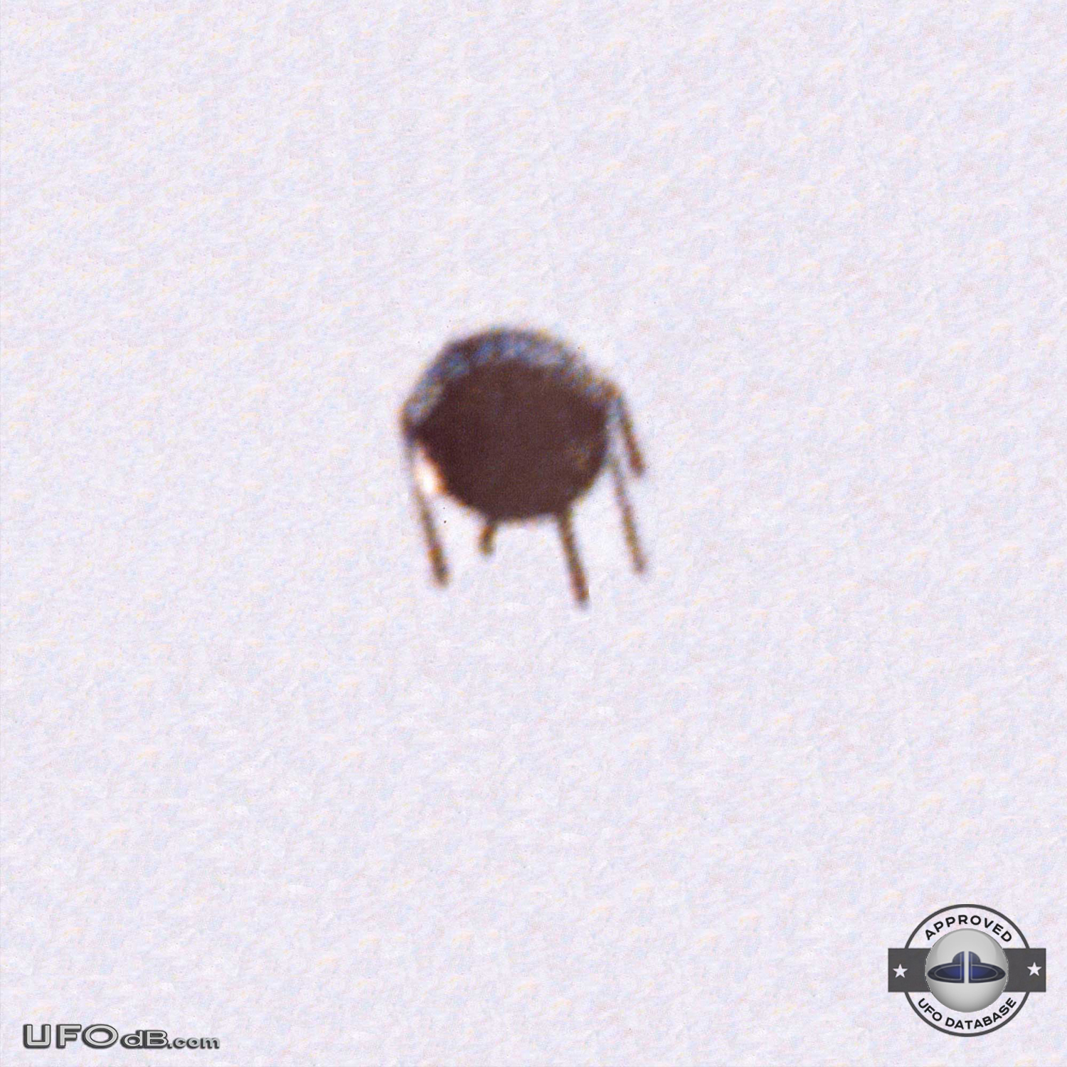 Strange UFO similar to Sputnik satellite seen in Alfena Portugal 1990 UFO Picture #472-1