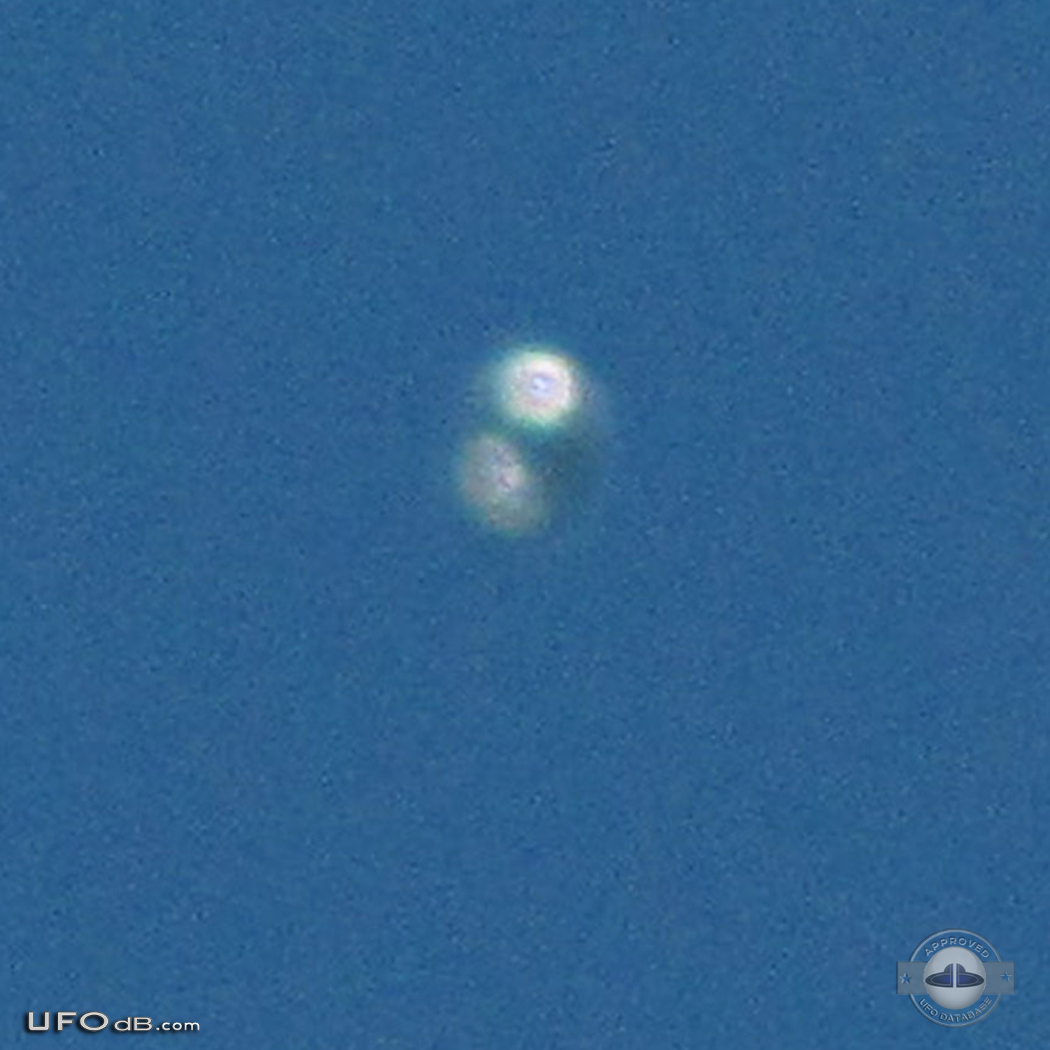 Donut shaped UFO with glowing silver material over Scituate Ma US 2012 UFO Picture #481-5
