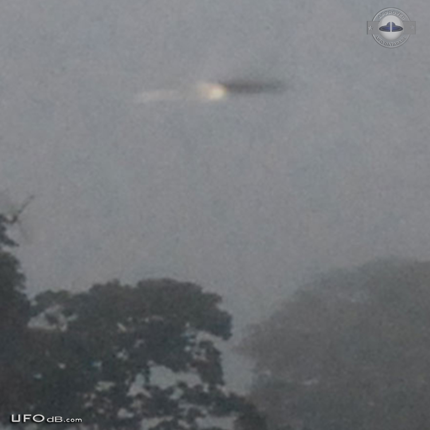 Cattle farm picture reveals passing saucer UFO in Portugesa, Venezuela UFO Picture #484-3