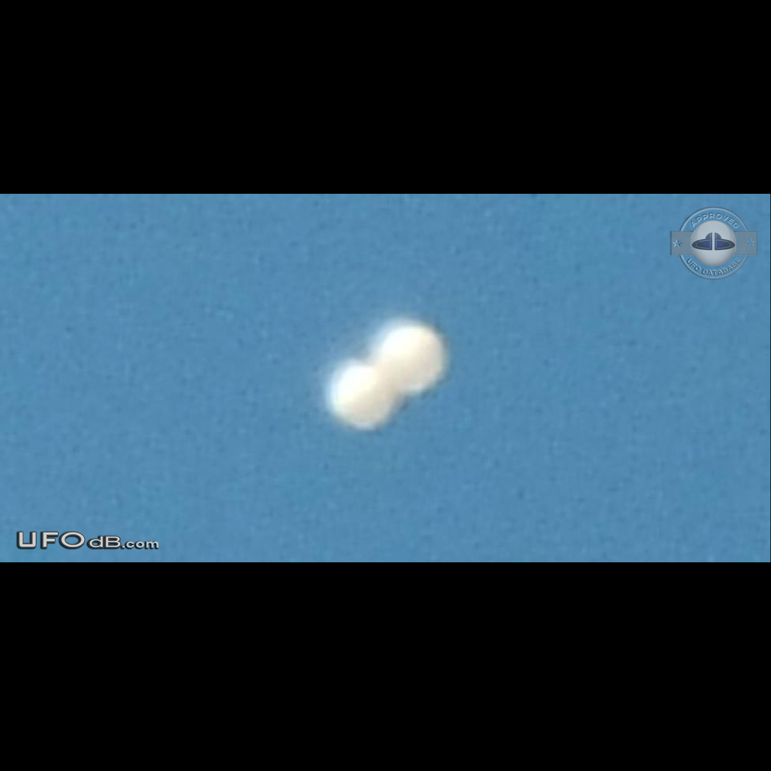 Twin sphere UFO caught on picture over Bradford west Yorkshire UK 2012 UFO Picture #486-1