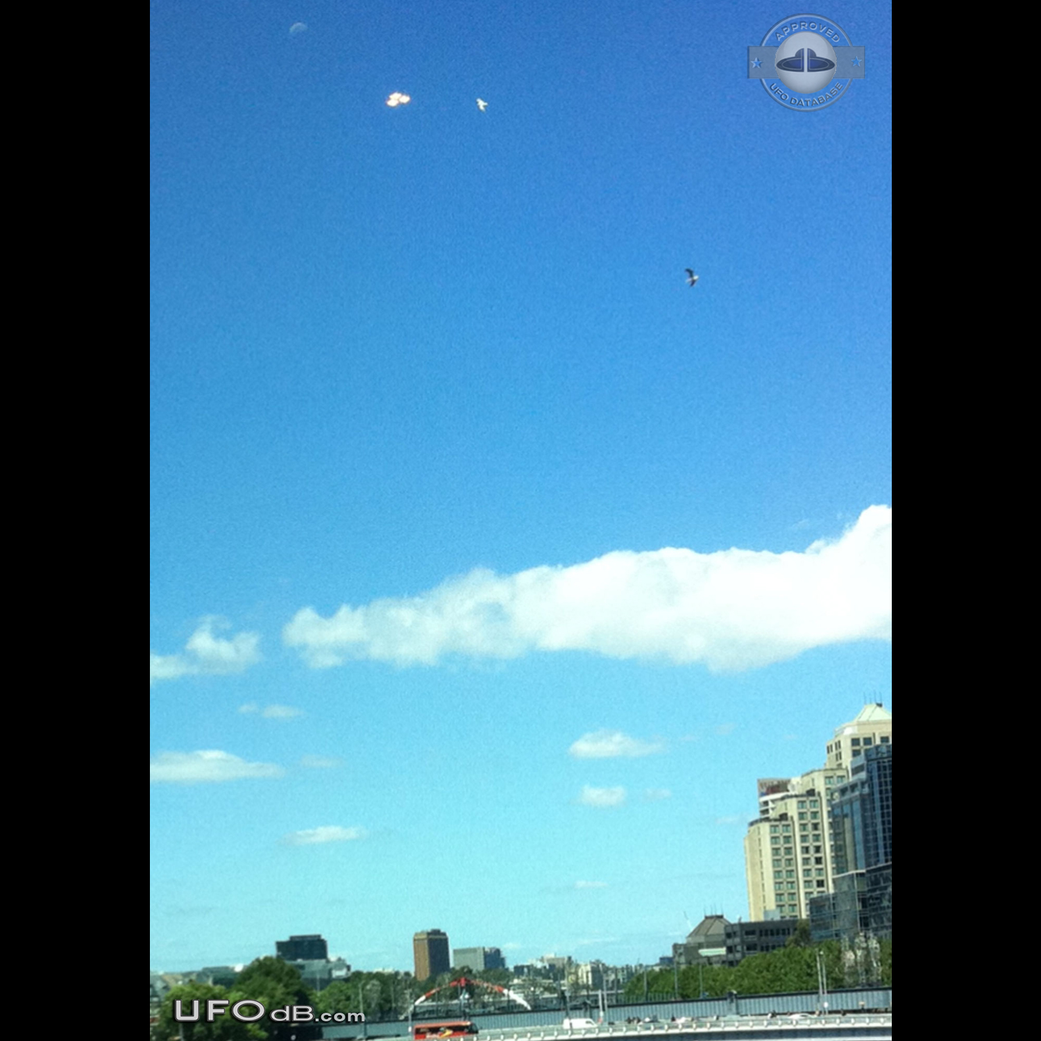 Three UFO saucers in triangular formation in Melbourne Australia 2011 UFO Picture #493-1