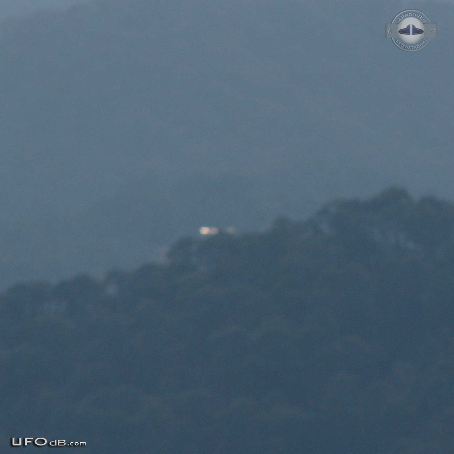 Long UFO hides in mountain tree tops in Valle de Bravo, Mexico 2012 UFO Picture #505-2