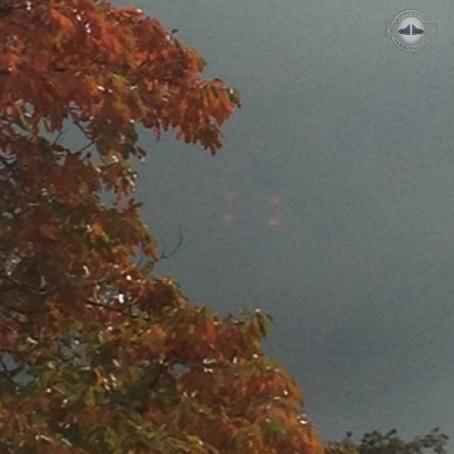 UFO made of 4 red dots in the grey sky of Bellmawr New Jersey USA 2012 UFO Picture #508-2