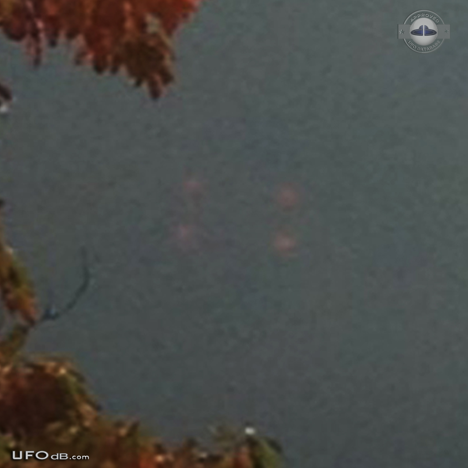 UFO made of 4 red dots in the grey sky of Bellmawr New Jersey USA 2012 UFO Picture #508-3