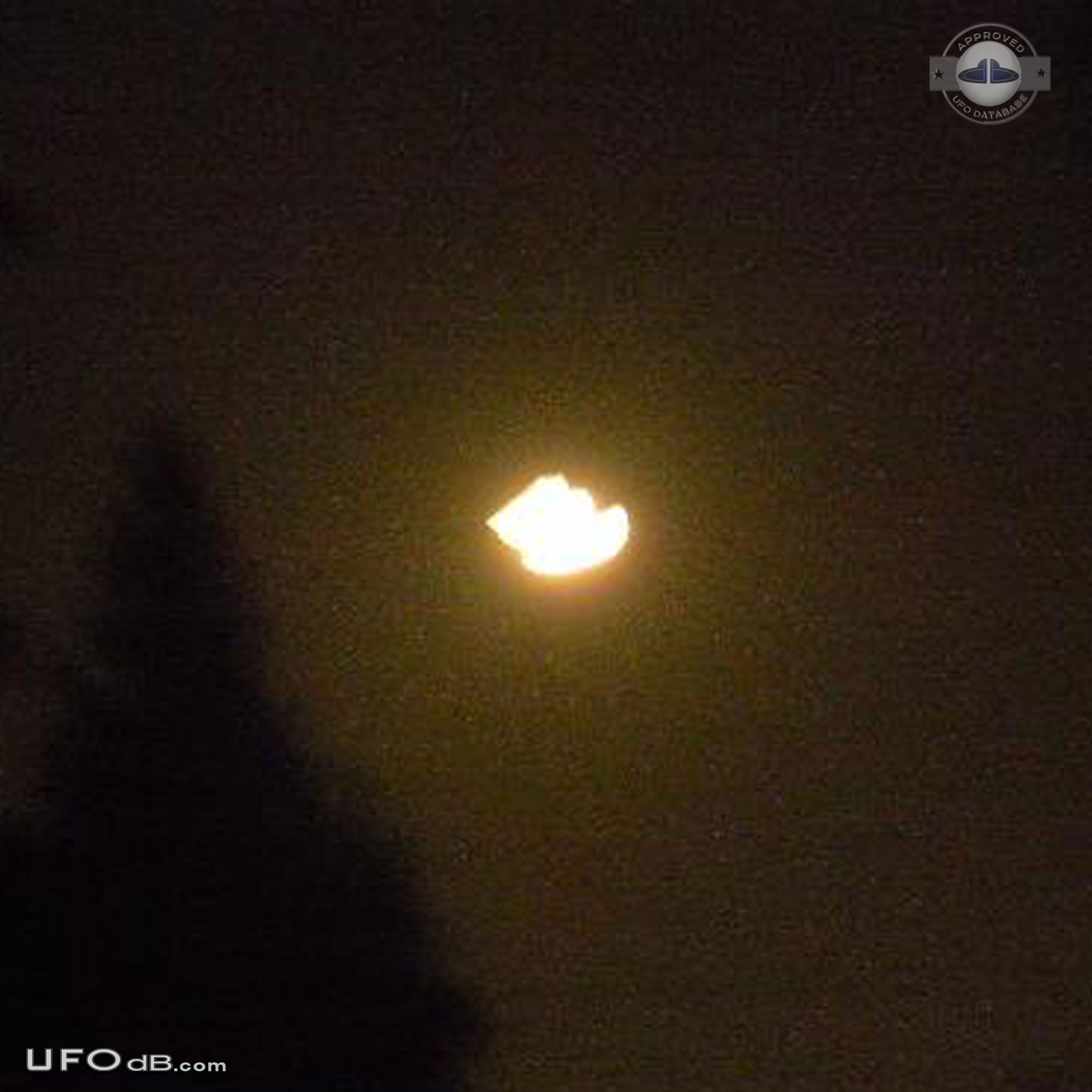 Strange Moon UFO with multicolor reflections in Indiana USA 2012 UFO Picture #510-1