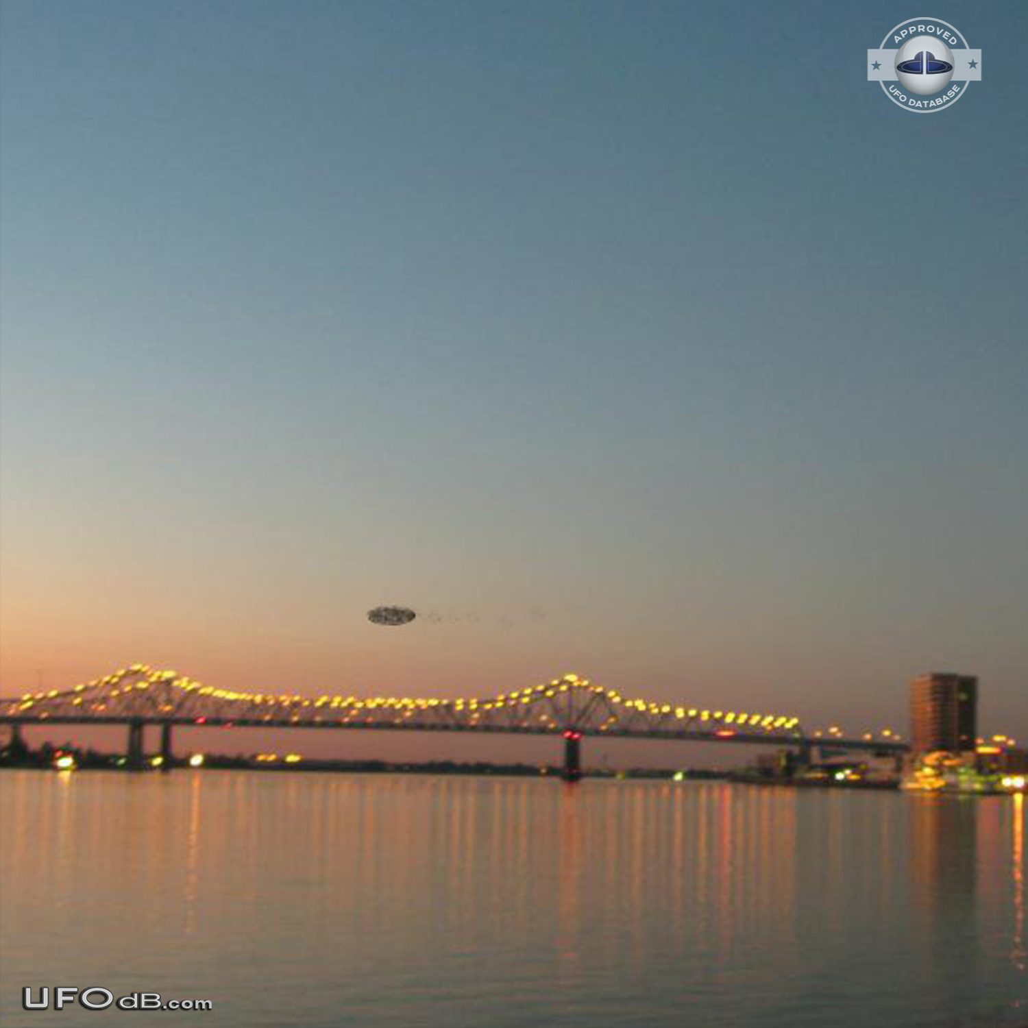 Dark shadowy disc UFO over the Mississippi New Orleans Louisiana 2012 UFO Picture #513-1