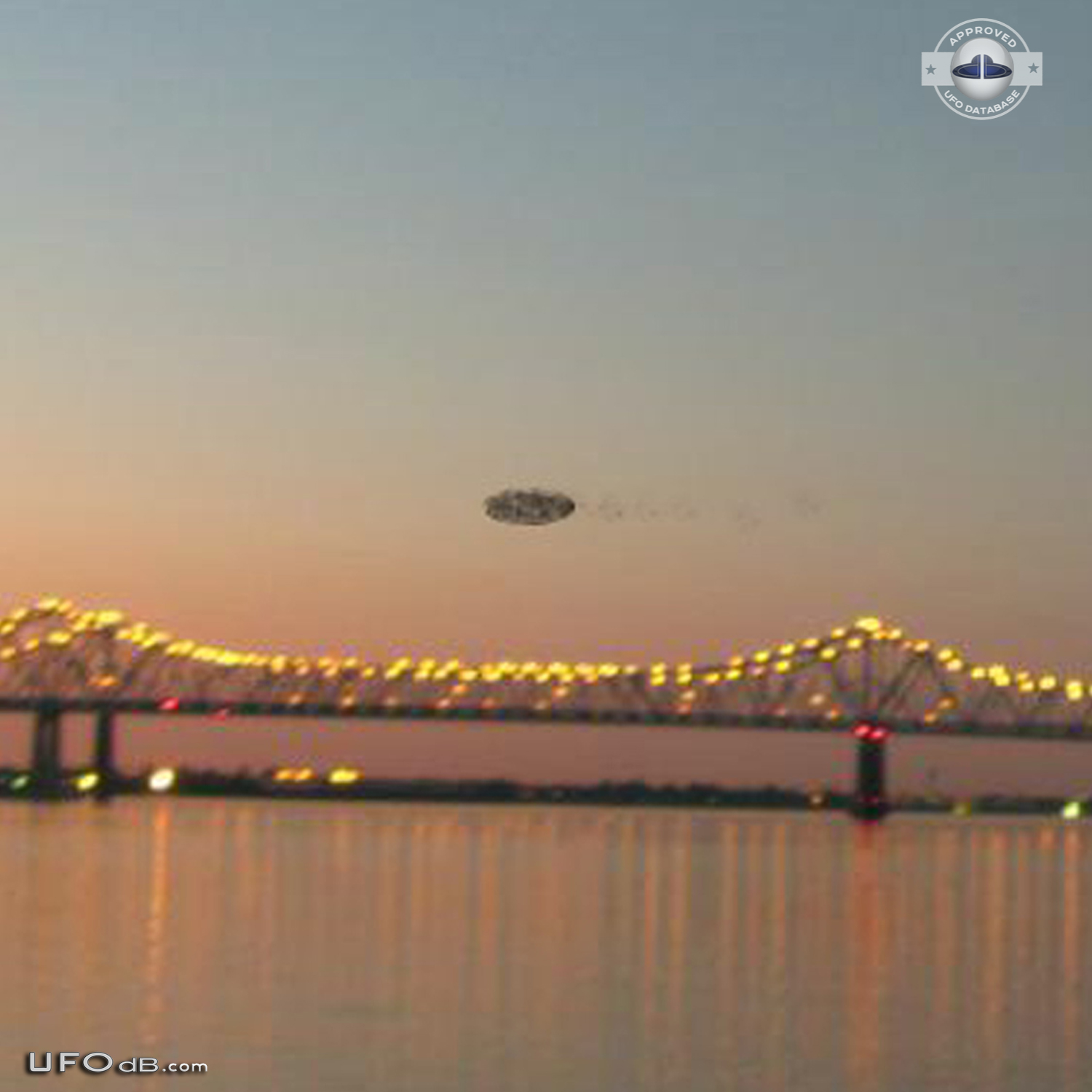 Dark shadowy disc UFO over the Mississippi New Orleans Louisiana 2012 UFO Picture #513-2
