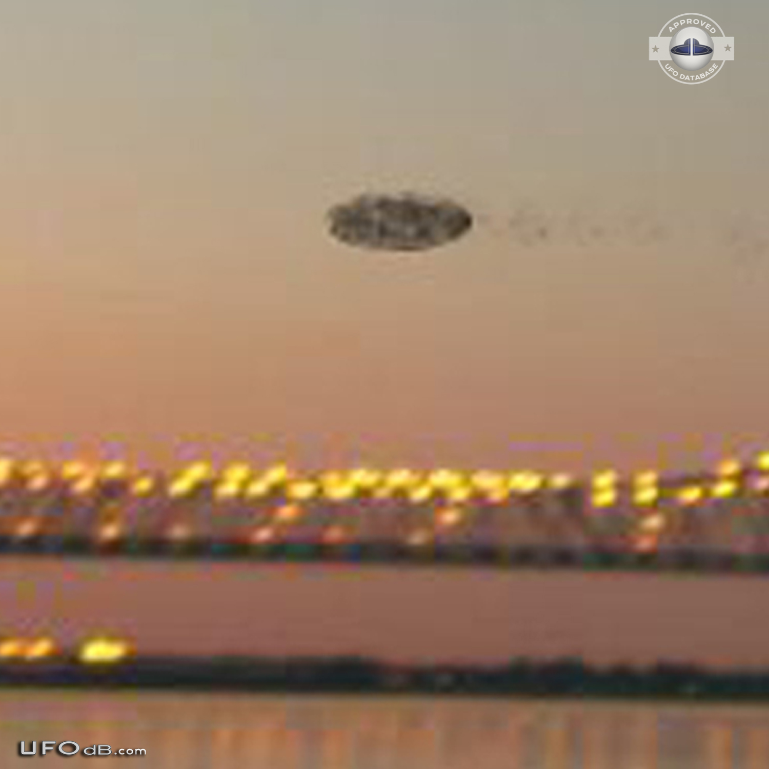 Dark shadowy disc UFO over the Mississippi New Orleans Louisiana 2012 UFO Picture #513-3