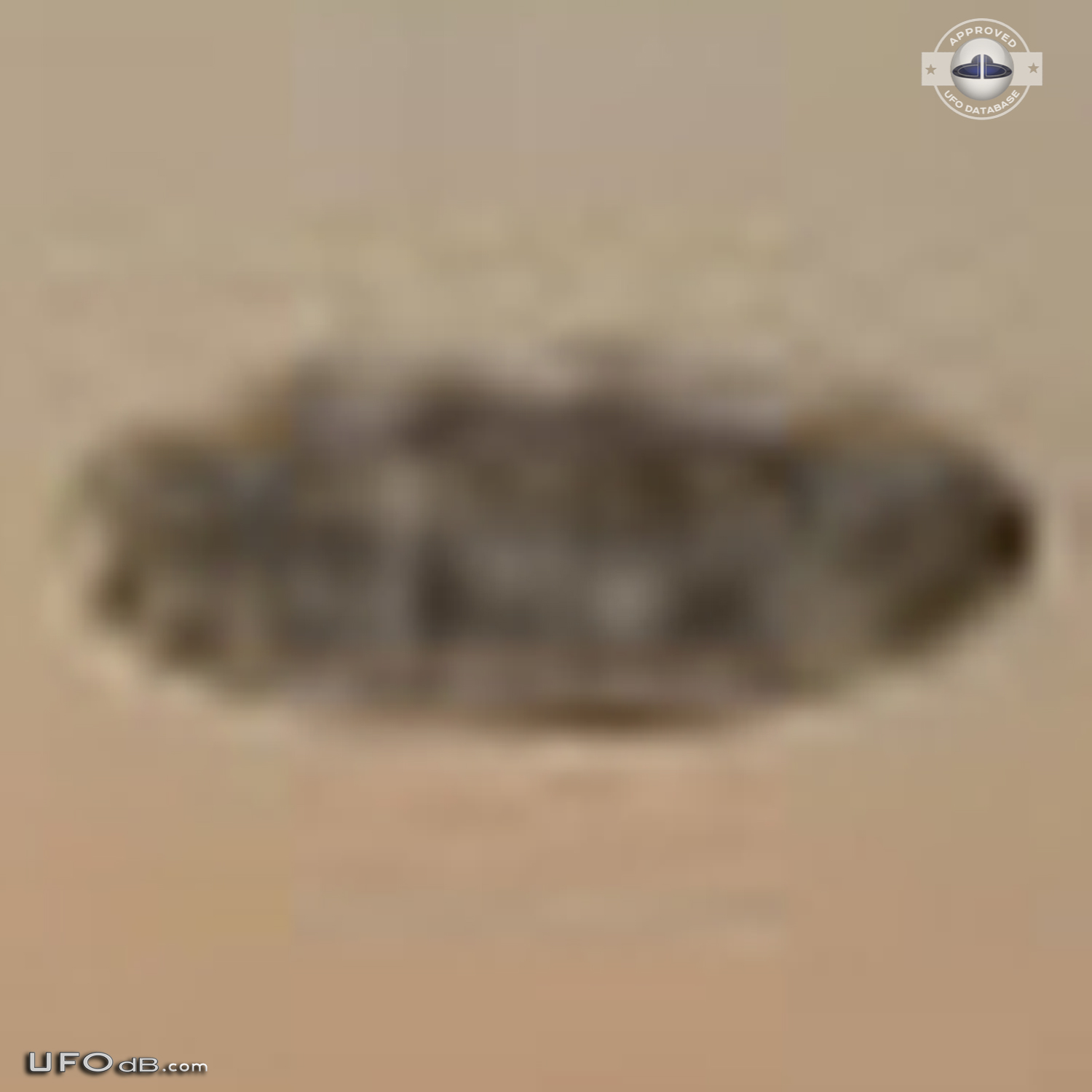 Dark shadowy disc UFO over the Mississippi New Orleans Louisiana 2012 UFO Picture #513-5