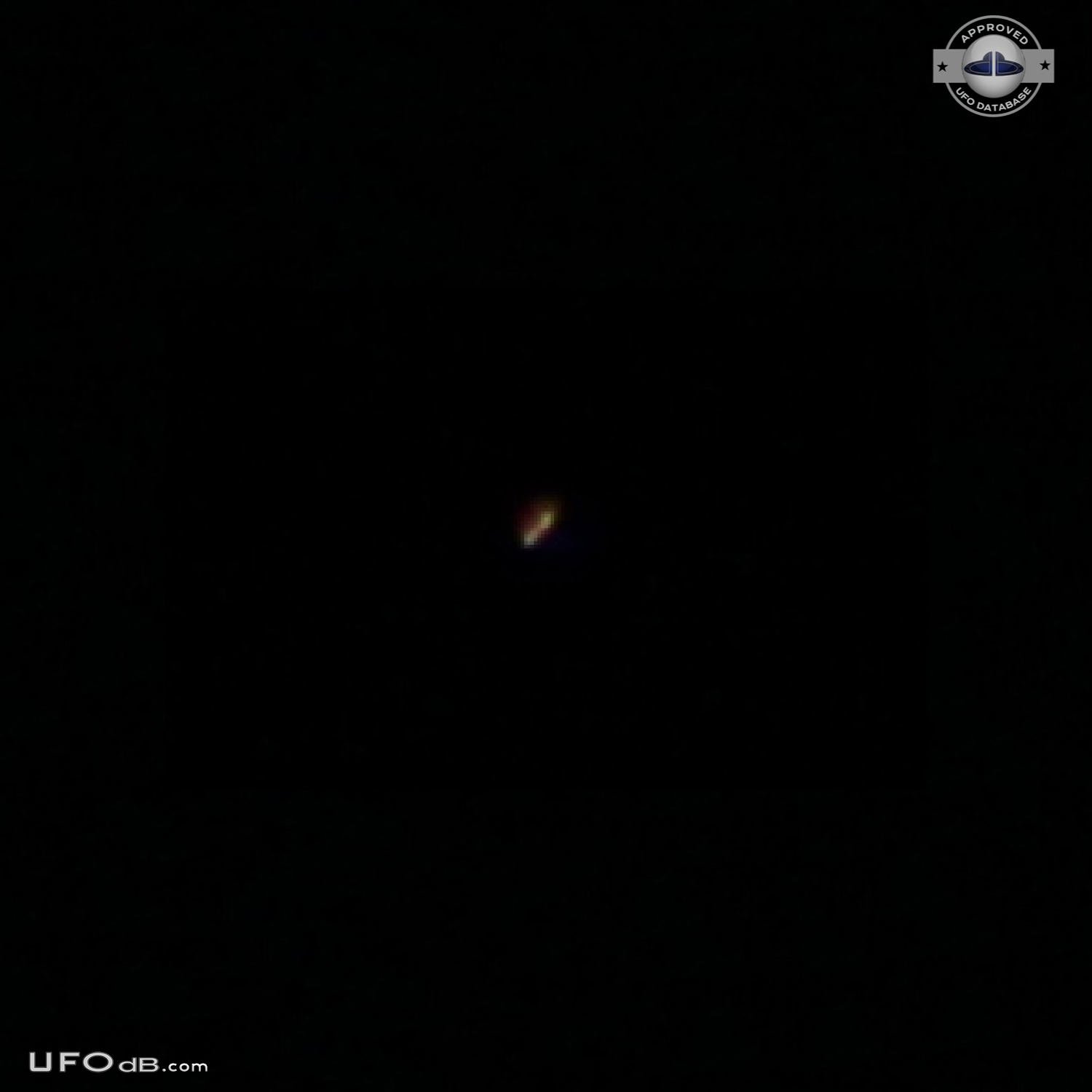 Bright mufti-colored flashing pulsating UFO on pictures - Florida 2012 UFO Picture #524-2