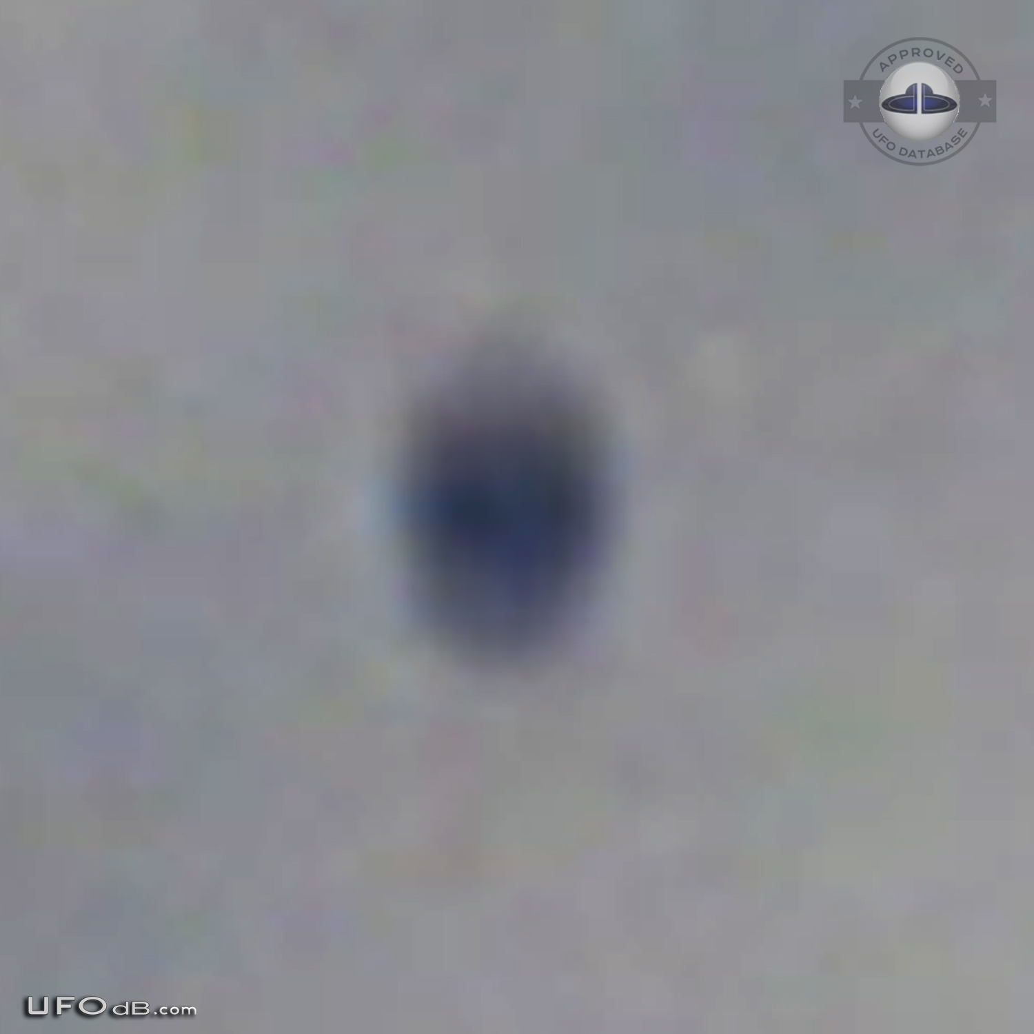 Four grey black disc UFOs near the airplane Mississauga, Ontario 2010 UFO Picture #531-4