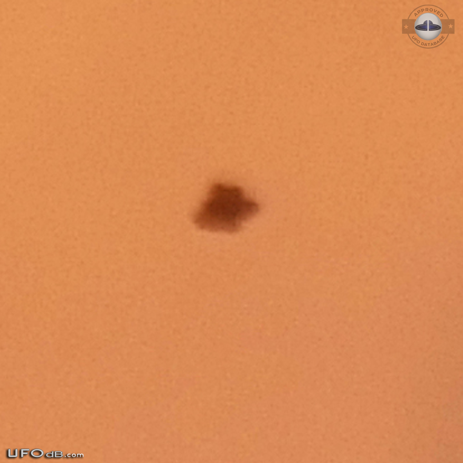 3 witness saw a black bell UFO disappearing in clouds - Australia 2013 UFO Picture #551-3