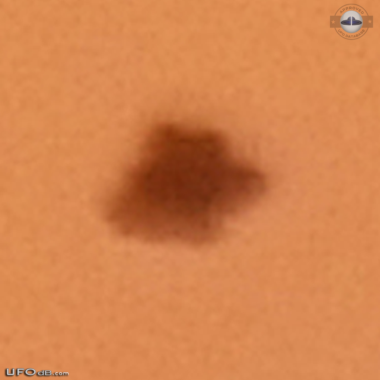 3 witness saw a black bell UFO disappearing in clouds - Australia 2013 UFO Picture #551-4