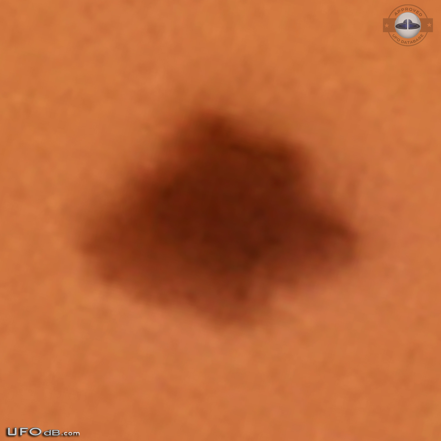 3 witness saw a black bell UFO disappearing in clouds - Australia 2013 UFO Picture #551-5