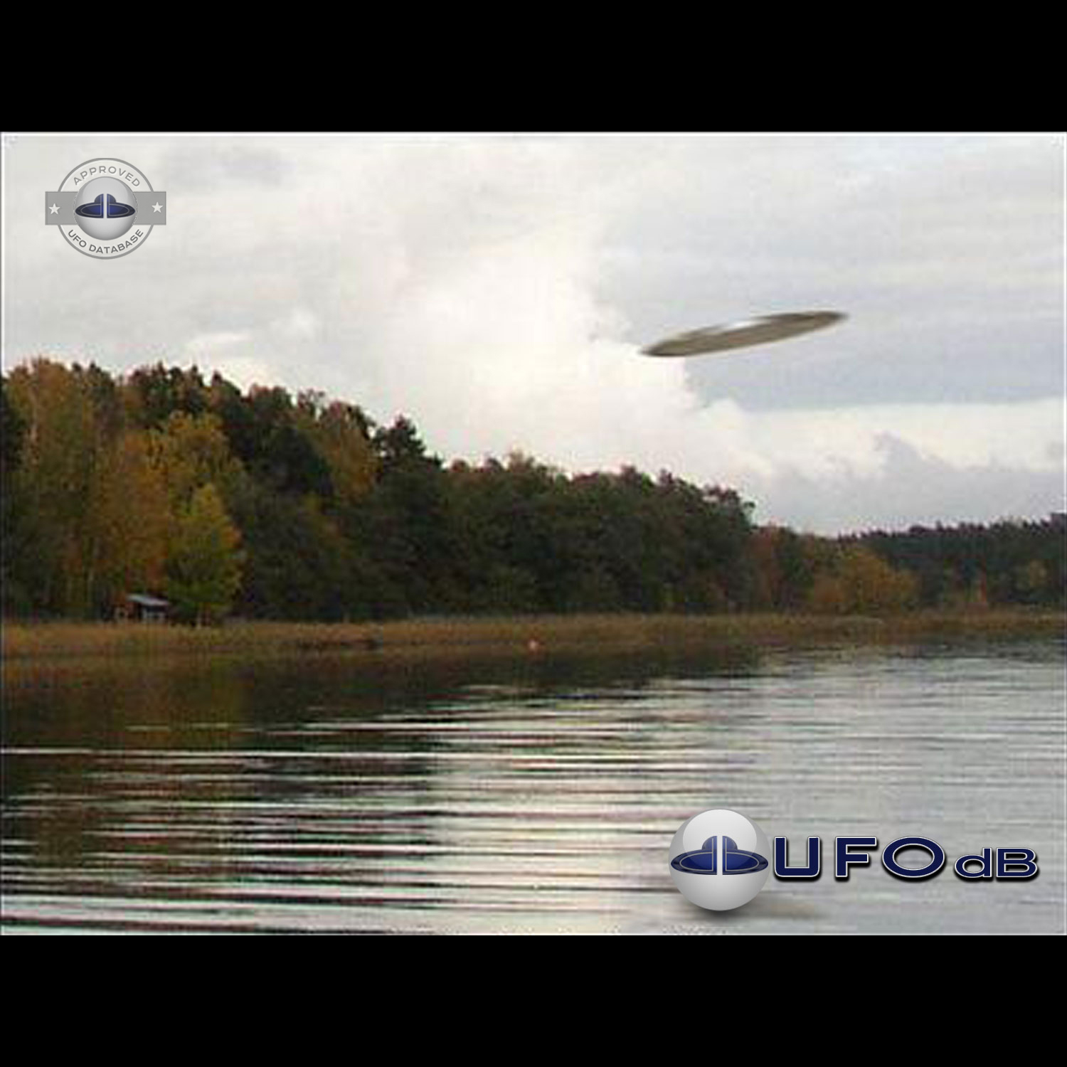 Clean UFO picture UFO disc flying over a lake in Kustavi Finland UFO Picture #56-1