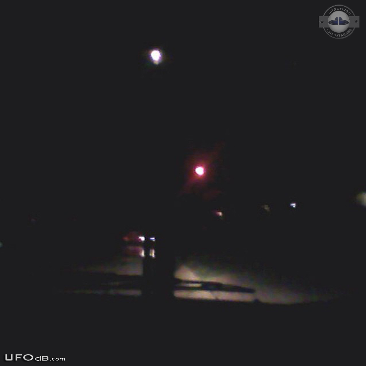 Bright glowing hovering sphere UFO over St Louis Missouri - 2014 UFO Picture #560-1