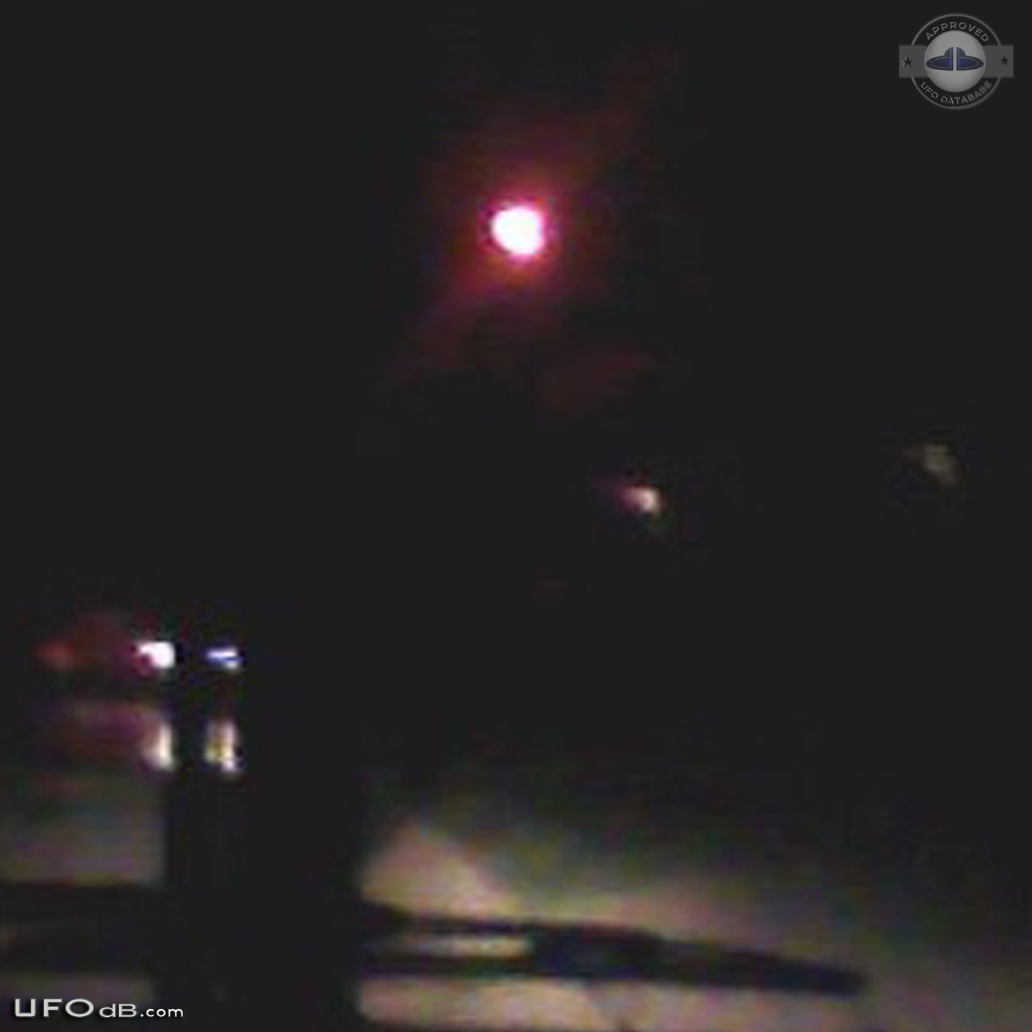 Bright glowing hovering sphere UFO over St Louis Missouri - 2014 UFO Picture #560-3