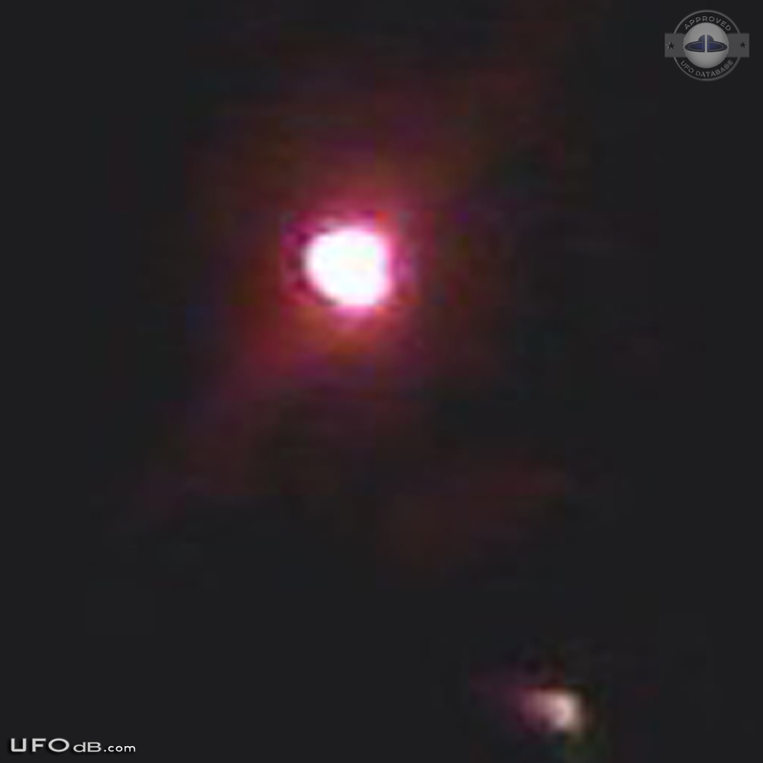 Bright glowing hovering sphere UFO over St Louis Missouri - 2014 UFO Picture #560-4