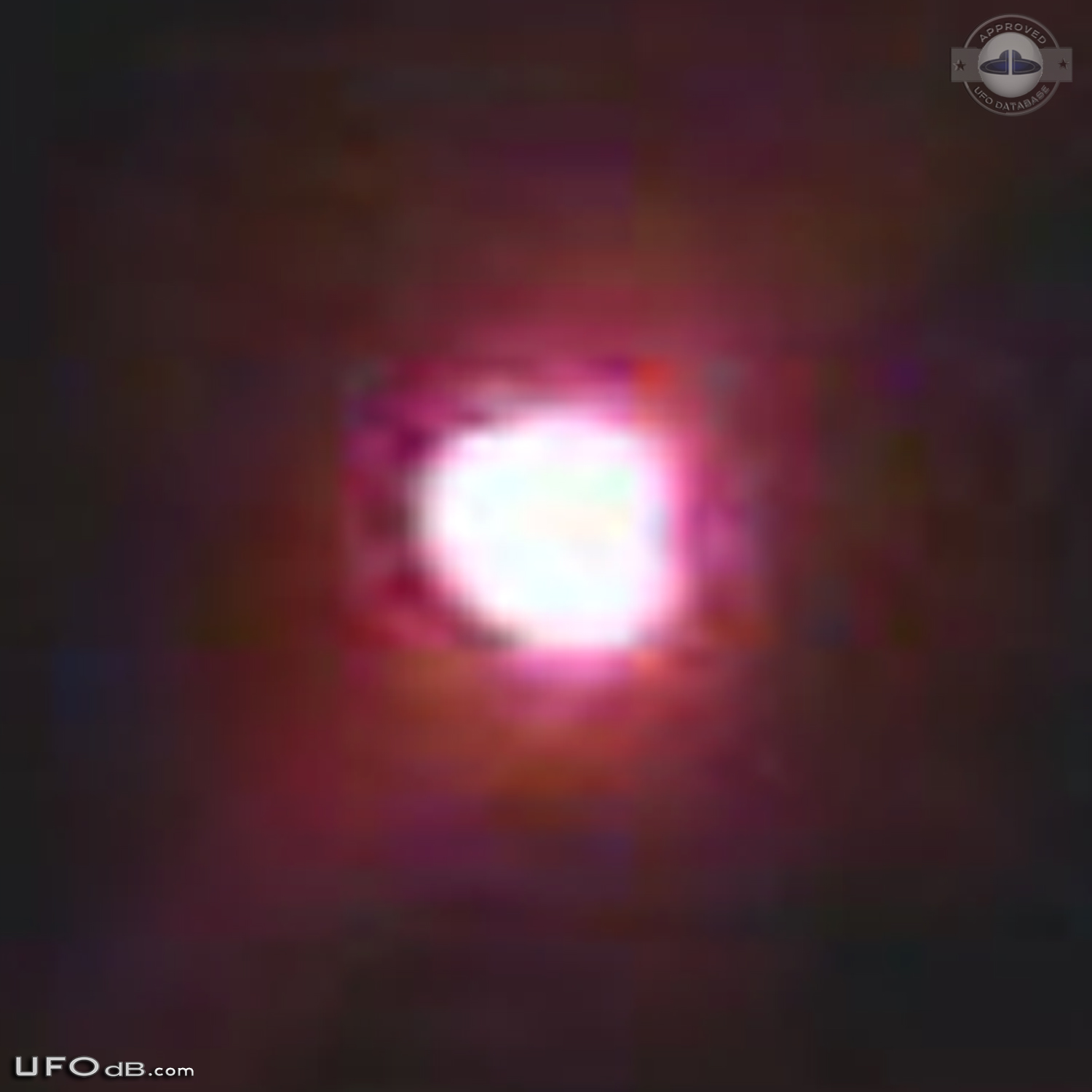 Bright glowing hovering sphere UFO over St Louis Missouri - 2014 UFO Picture #560-5