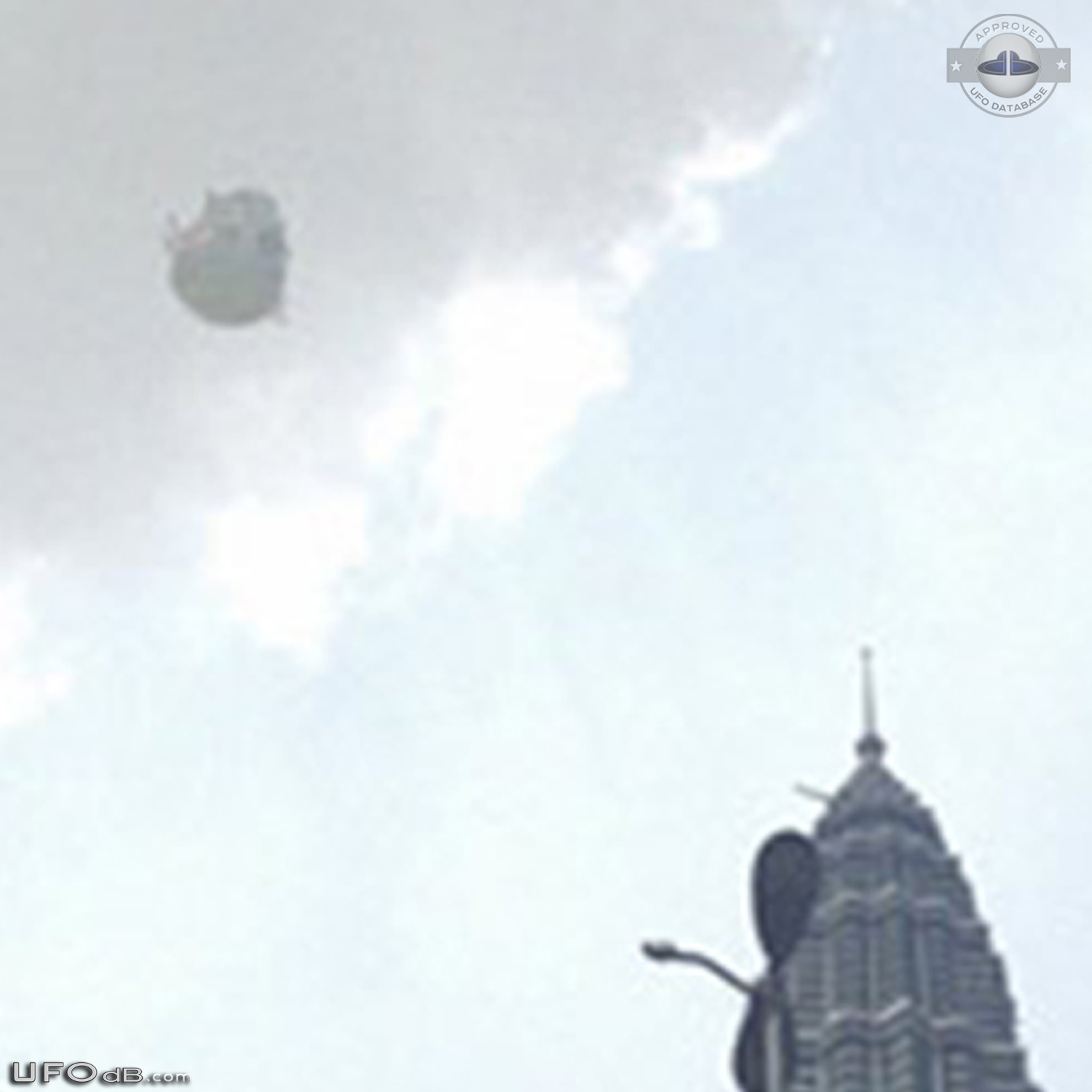 UFO near the Petronas Twin Towers in Kuala Lumpur, Malaysia - May 2014 UFO Picture #565-3