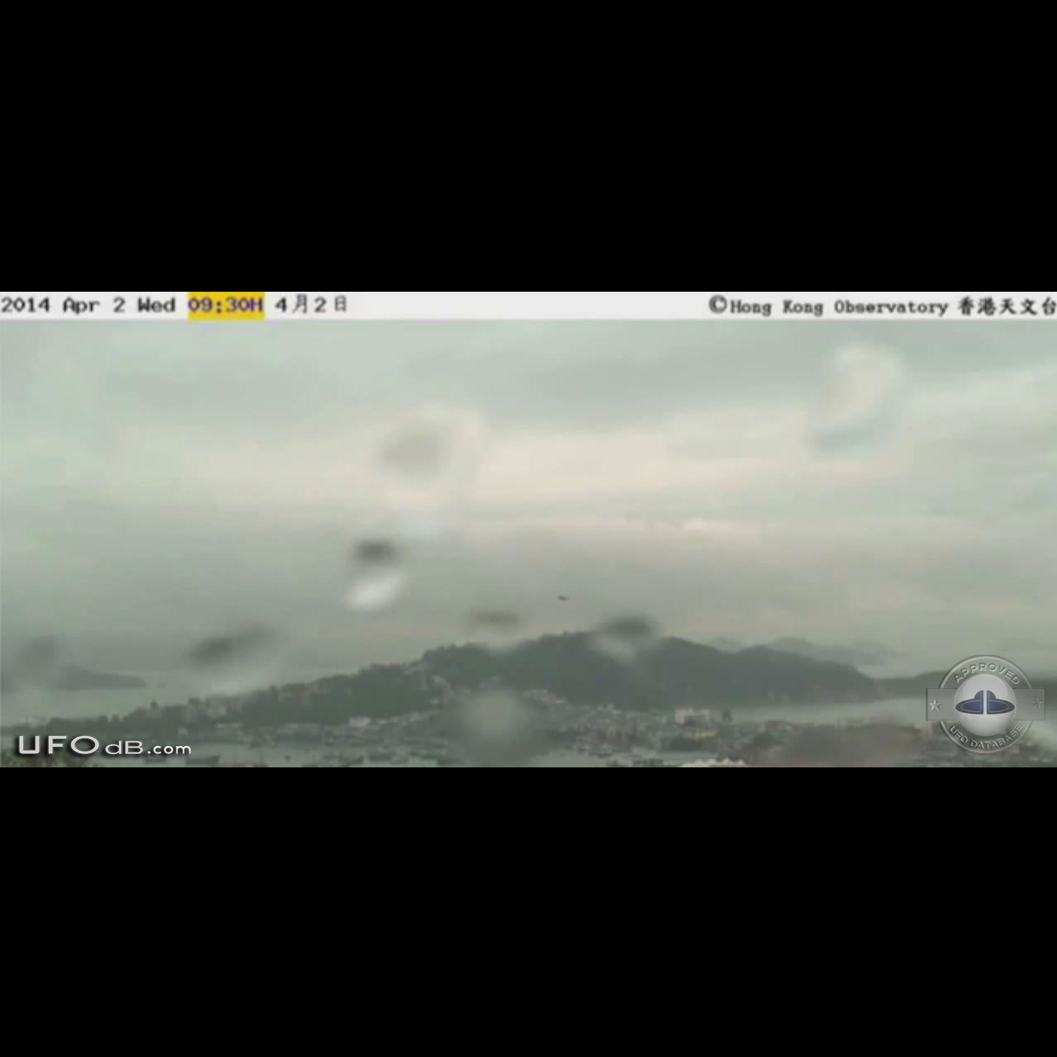UFO caught on Picture by Hong Kong weather camera - April 2014 UFO Picture #567-2
