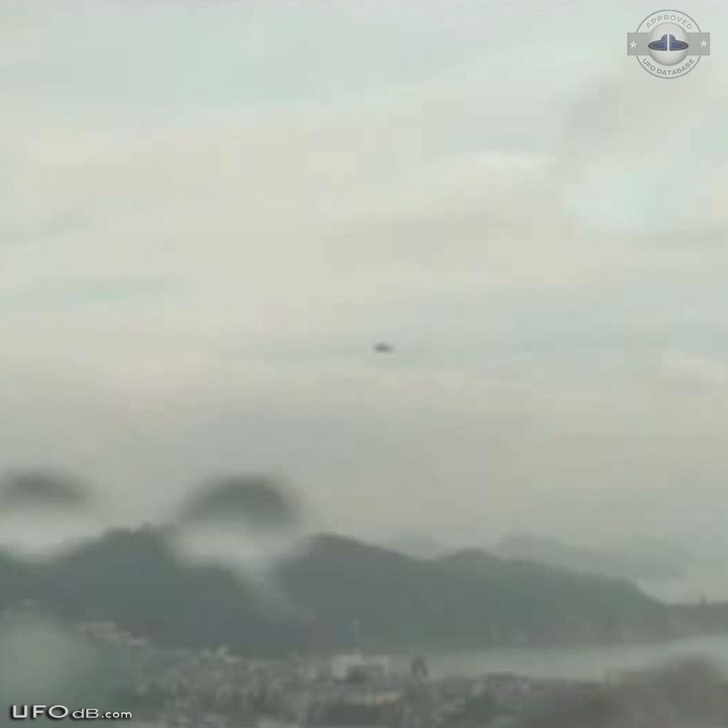UFO caught on Picture by Hong Kong weather camera - April 2014 UFO Picture #567-3