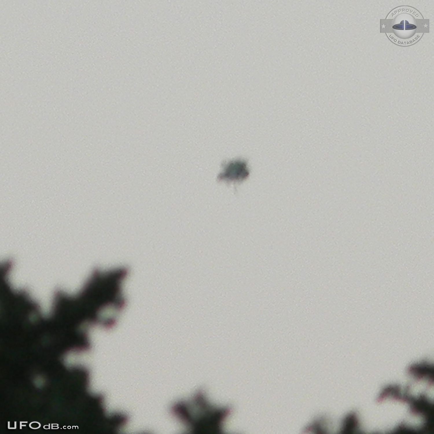 UFO hovered over Lake Lewisville in Texas and extended appendage 2014 UFO Picture #570-4