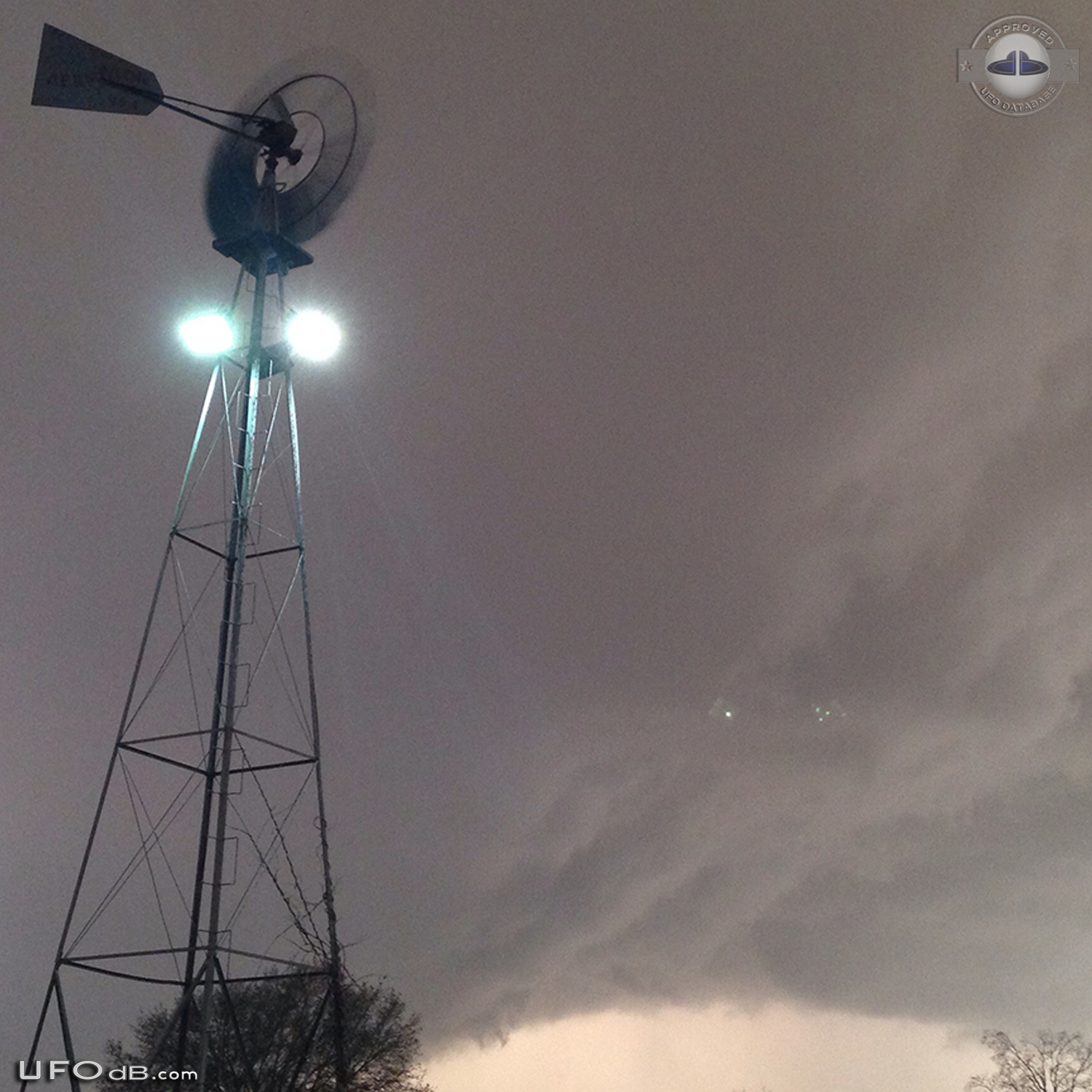 Diamond UFO hiding in the storm caught on picture over Katy Texas 2014 UFO Picture #573-3