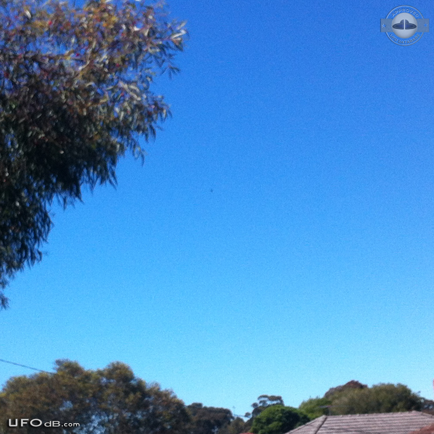 Donut Shaped UFO in blue sky over Blackburn North, Australia in 2012 UFO Picture #575-2